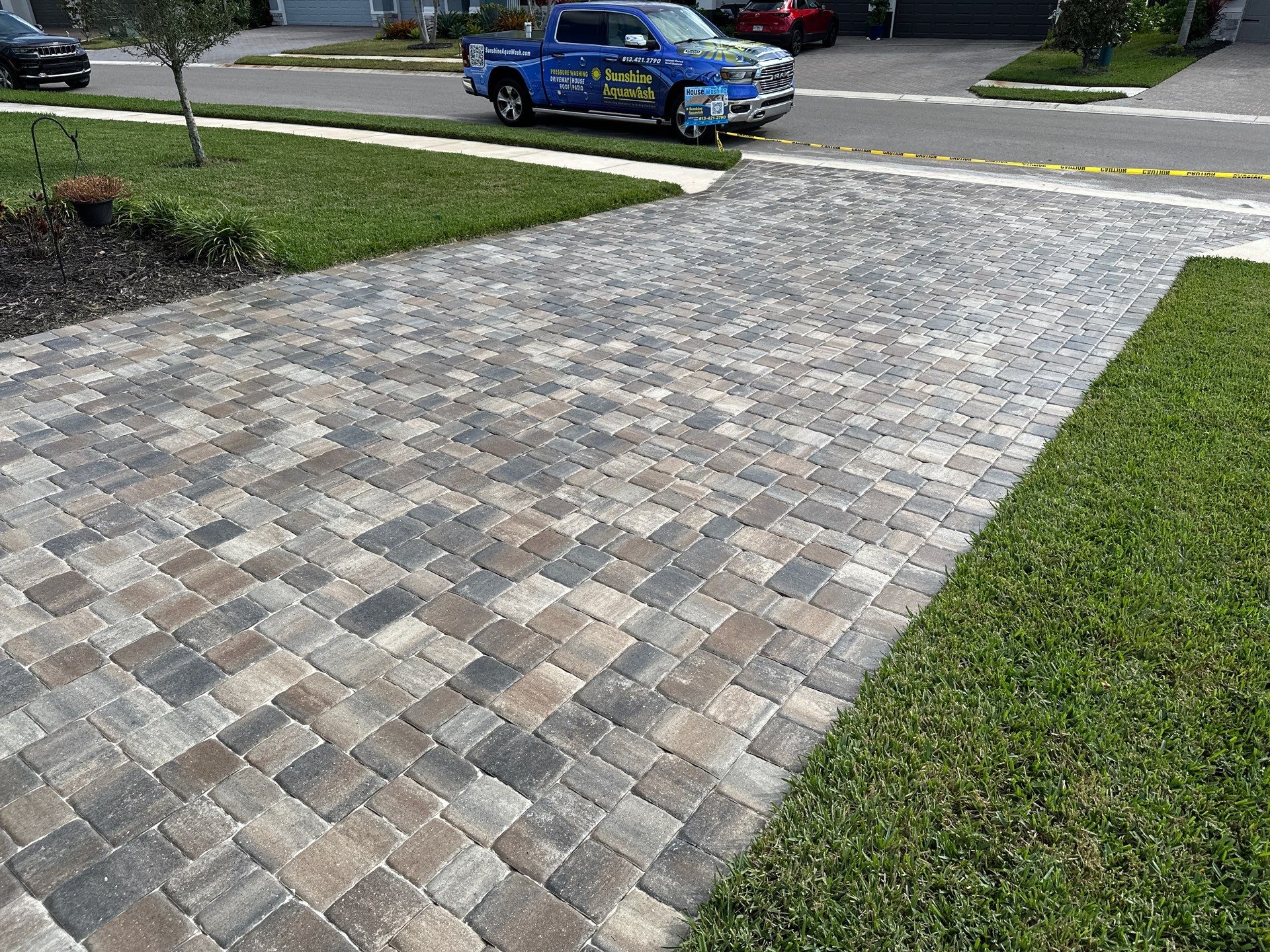 House Wash, Paver Driveway & Sidewalk Cleaning + Sanding & Sealing in Trevesta Community, Palmetto, FL by Sunshine AquaWash