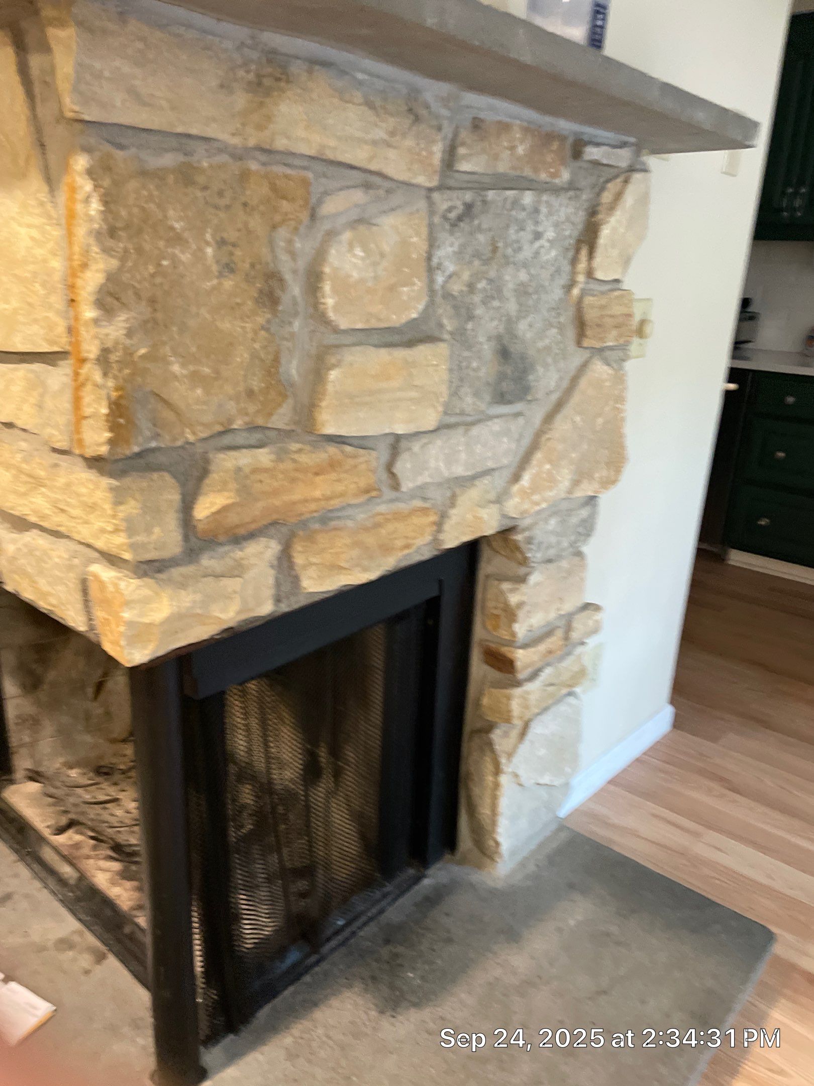 Gas Insert in corner fireplace by Neighborhood Chimney Services 