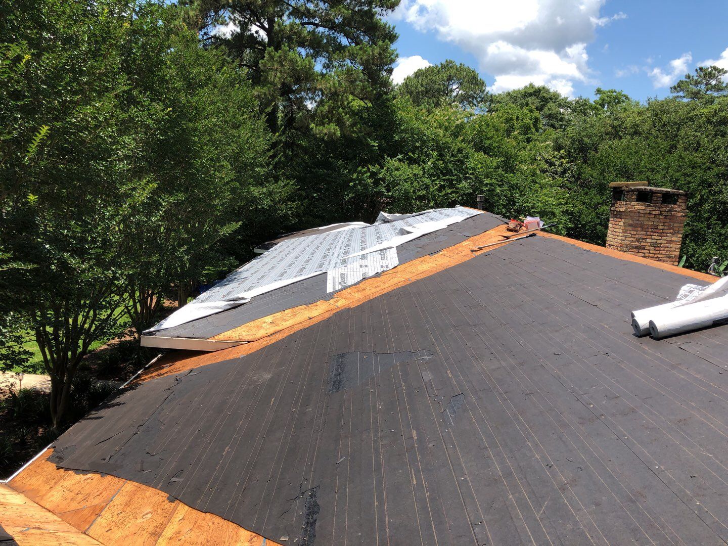 Residential Roofing Installation using Roof Replacement by American Roofing & Construction LLC