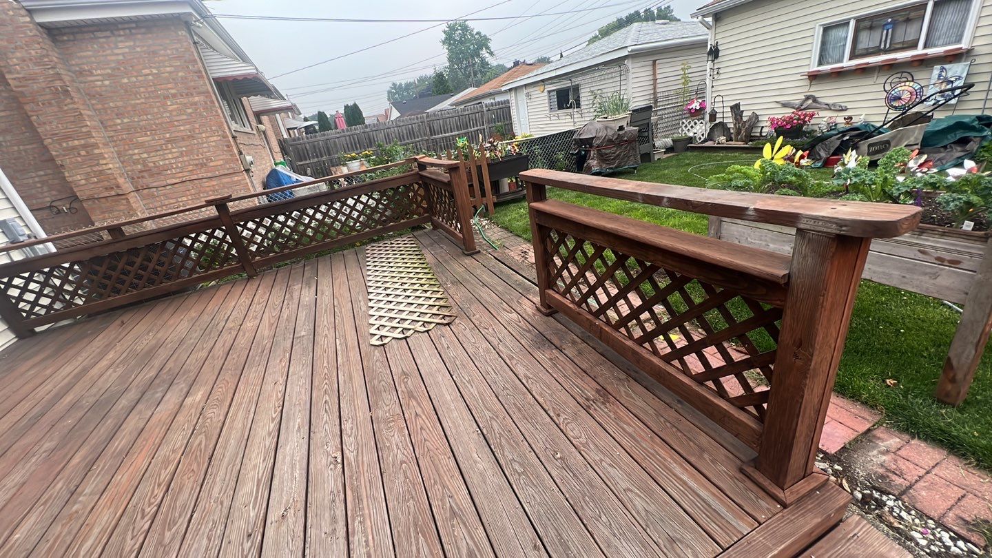 Wood cleaning and staining using Armstrong cloark oil stain by Northern Power Washing LLC.