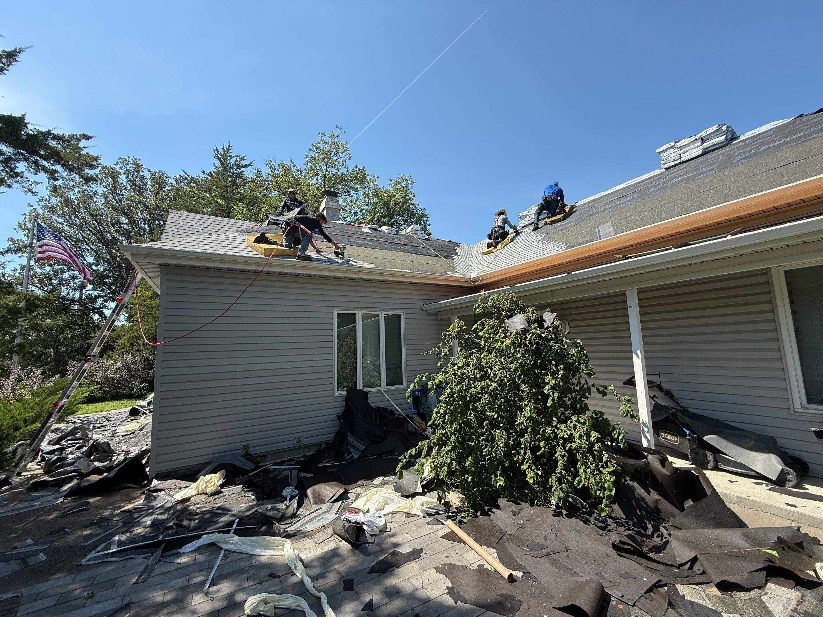 Asphalt Shingle and EPDM Membrane Roof Installation in Mineola by Star Home