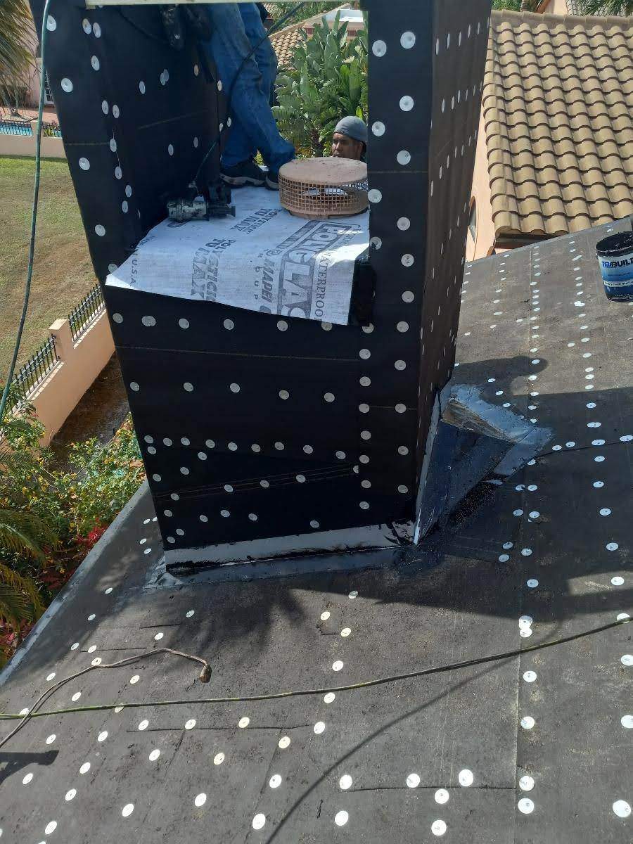 Complete Chimney Rebuild + Tile & Flat Re-Roof  by Morton Roofing, Inc.