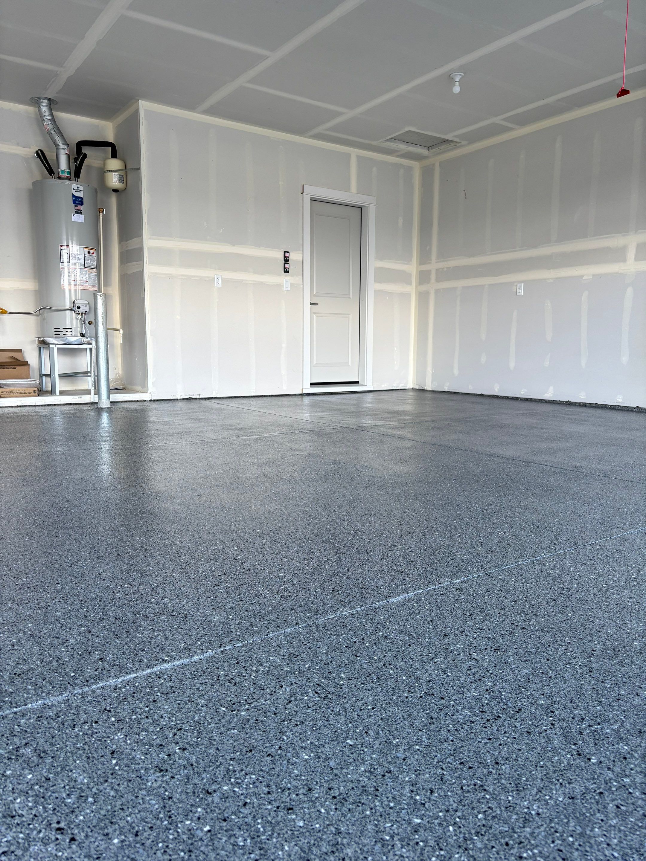 Garage Transformation using Slate Hybrid by Croc Coatings, LLC