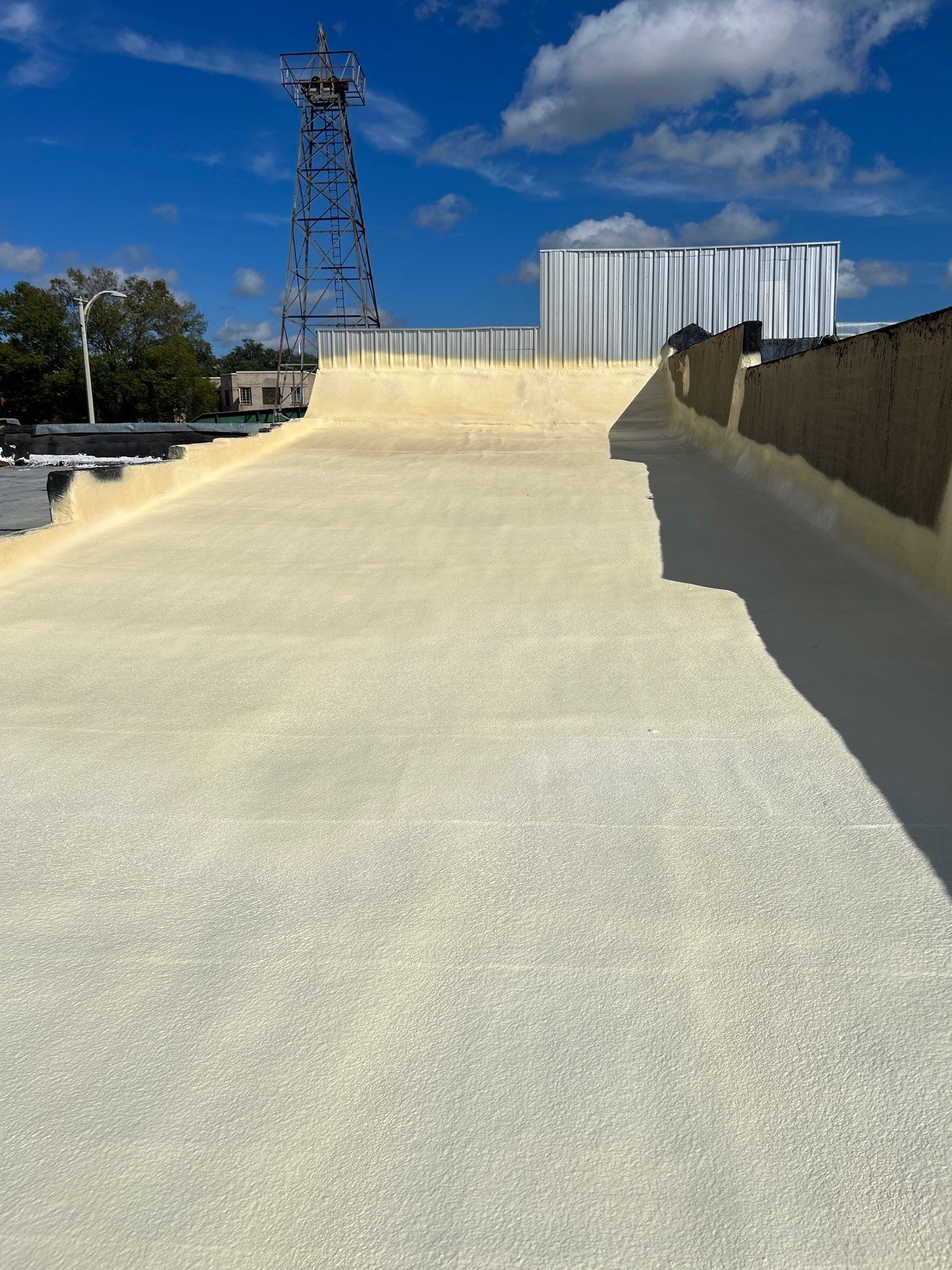 Downtown Gladewater Commercial Foam Roof Restoration – SPF + High-Tensile Acrylic by All Star Roofing LLC