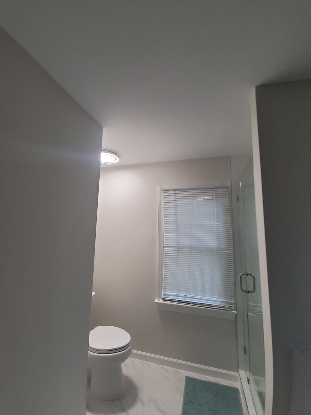 From Cramped & Carpeted to Bright & Modern: A Cary Bathroom Transformation by Elite Remodeling and Design LLC