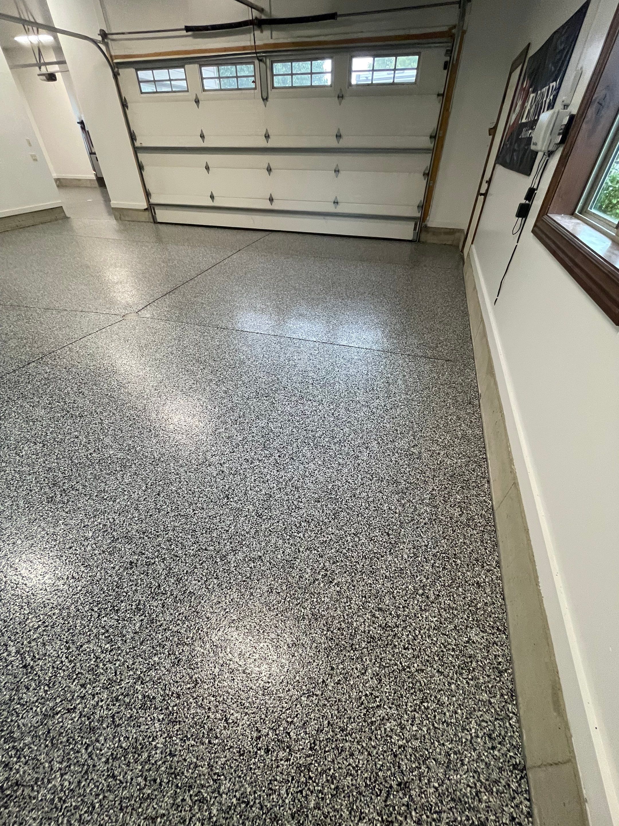 Garage Floor Coating and Domino Flake Finish in Sioux Falls by Select Painting, Coatings & Garage Cabinets