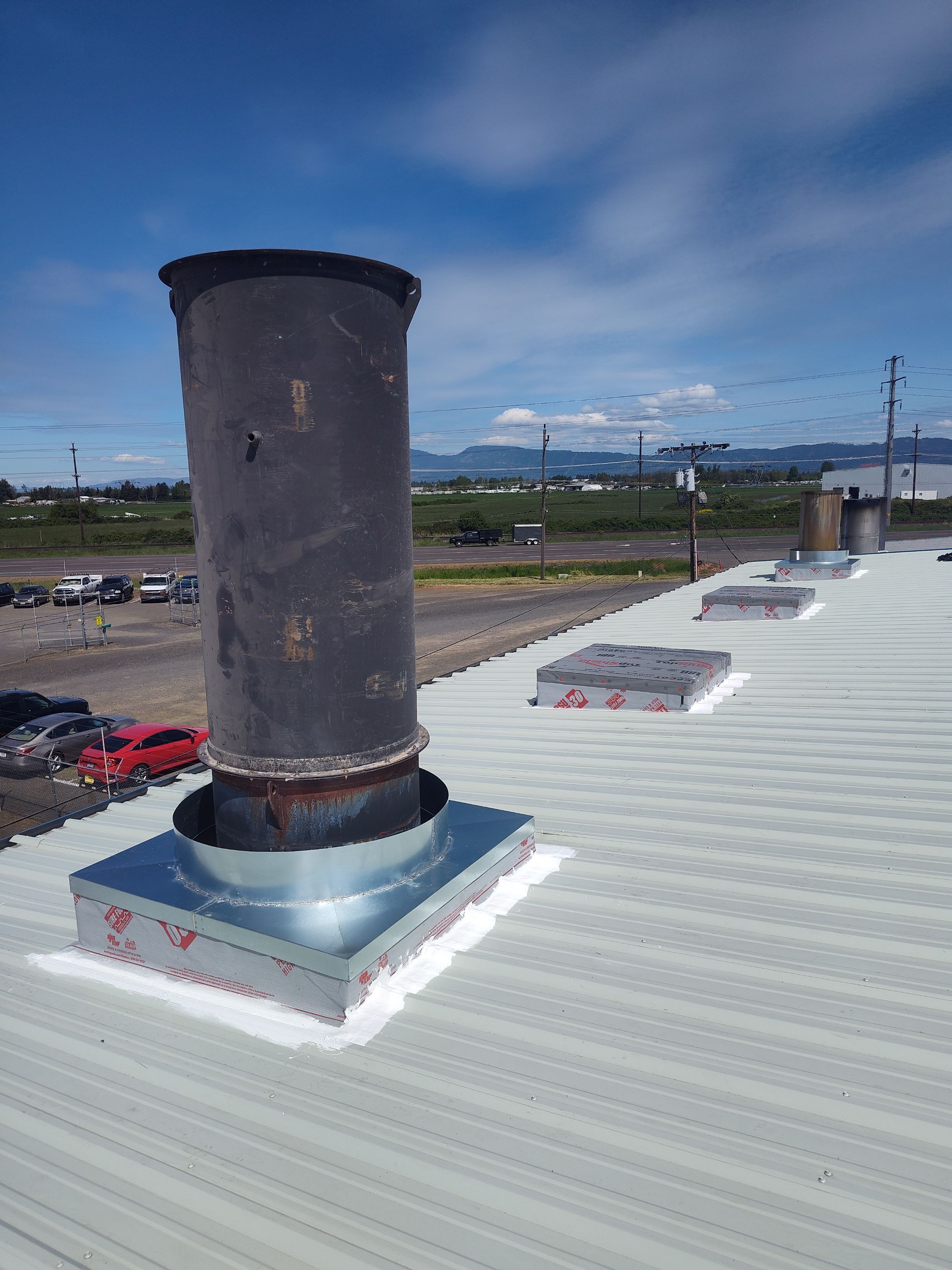 Installing New Curbs on a Metal Roof for new equipment by BEST Roofing & Waterproofing
