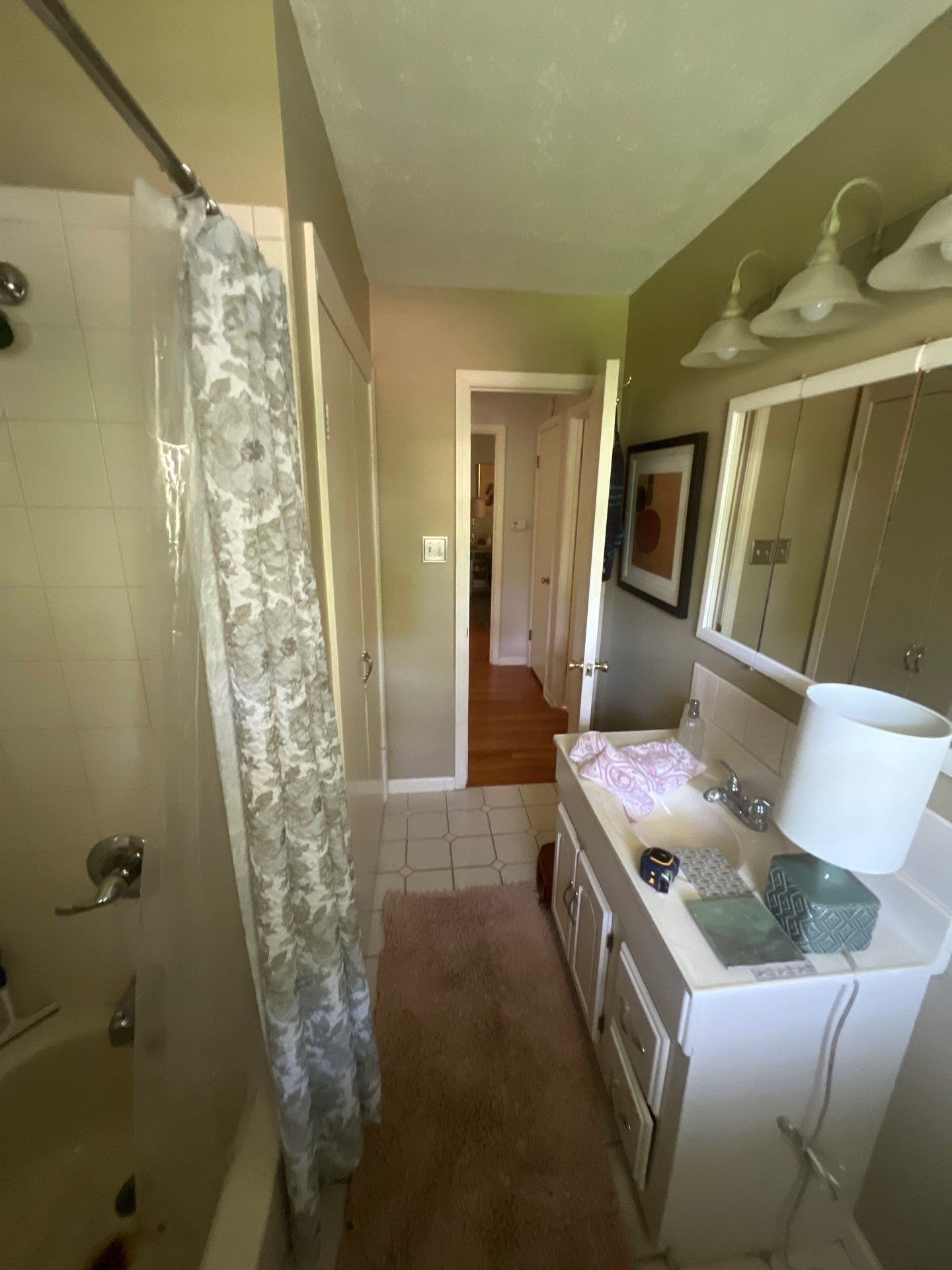Full bathroom with custom tile by The Shower Company