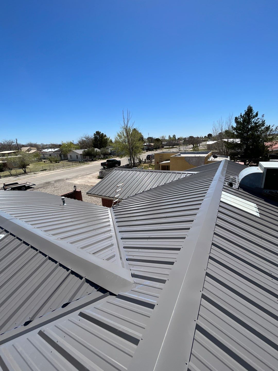 Ash Gray Exposed Fastener by Reimagine Roofing