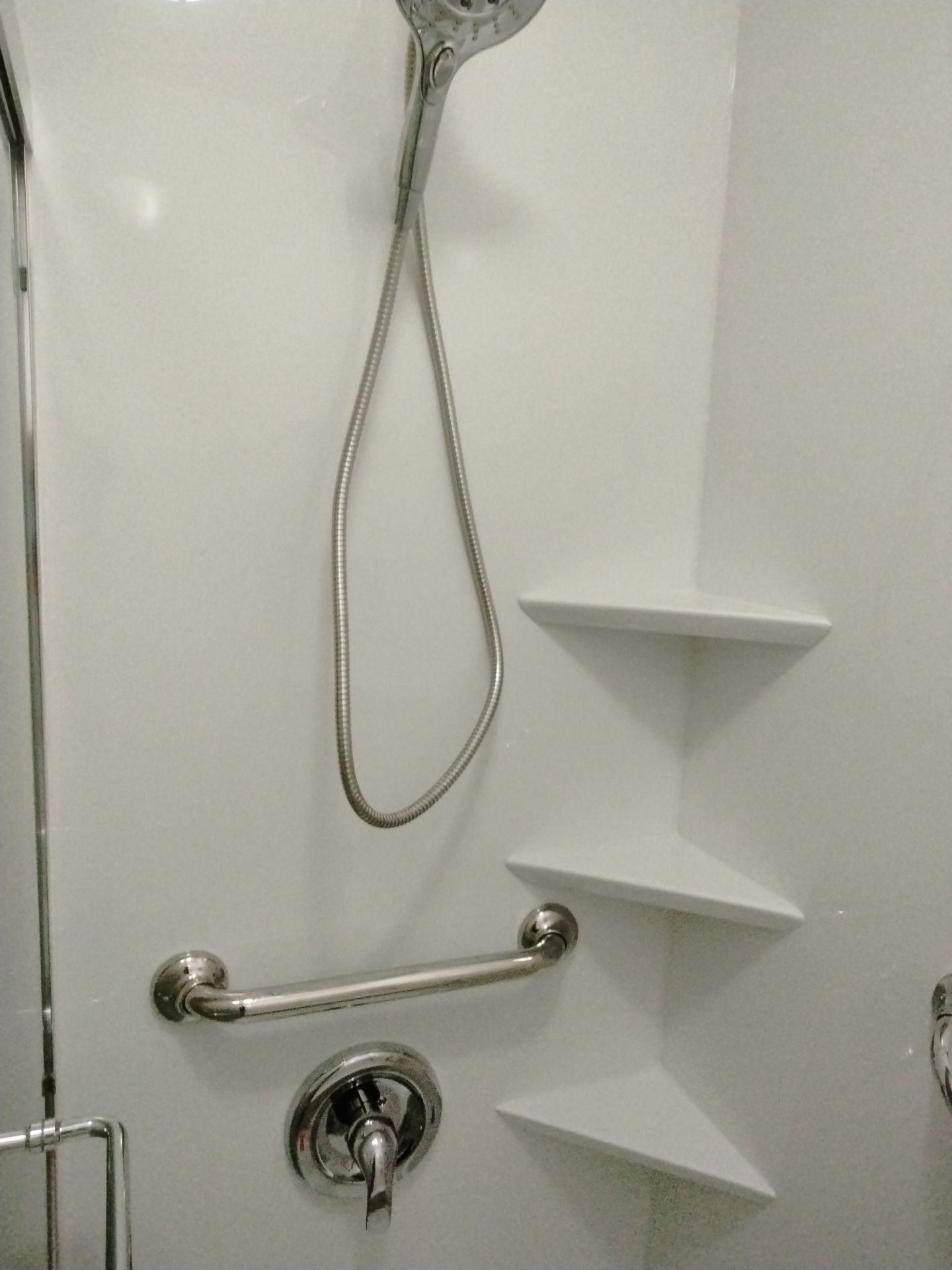 Tub to Shower Conversion using BCI Acrylic Shower System by Secure Construction Company Inc