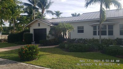 Residential Roofing Installation using 1" Nail strip metal roof
