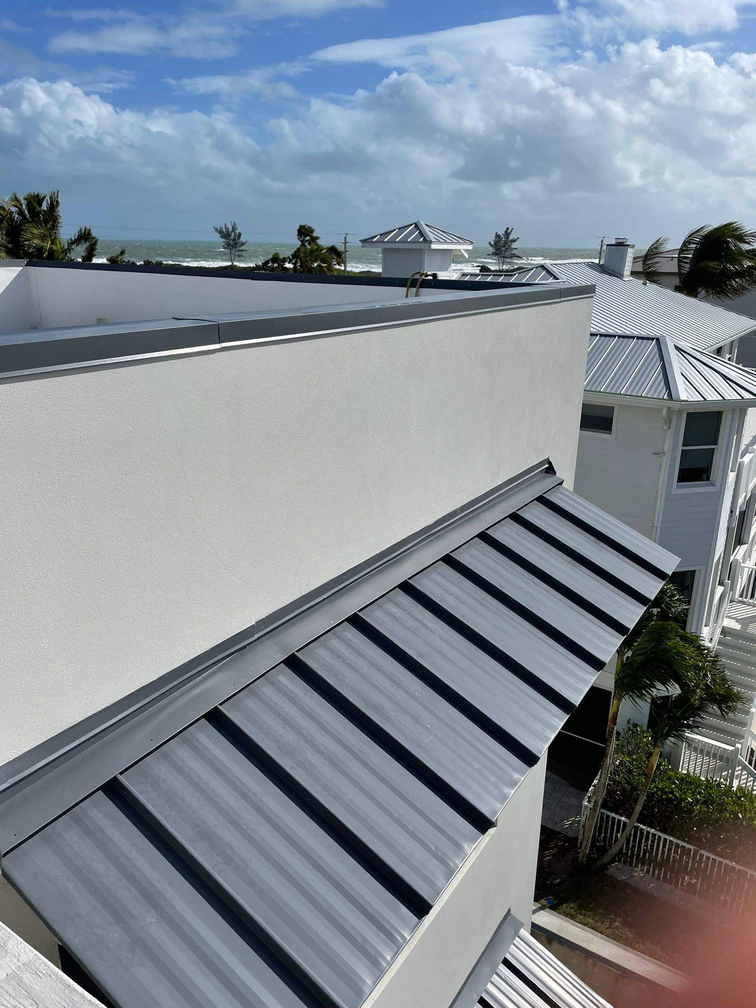 .032 Aluminum 1.5" Mechanical Seam Charcoal Gray by Total Roofing System The Metal Roof Experts