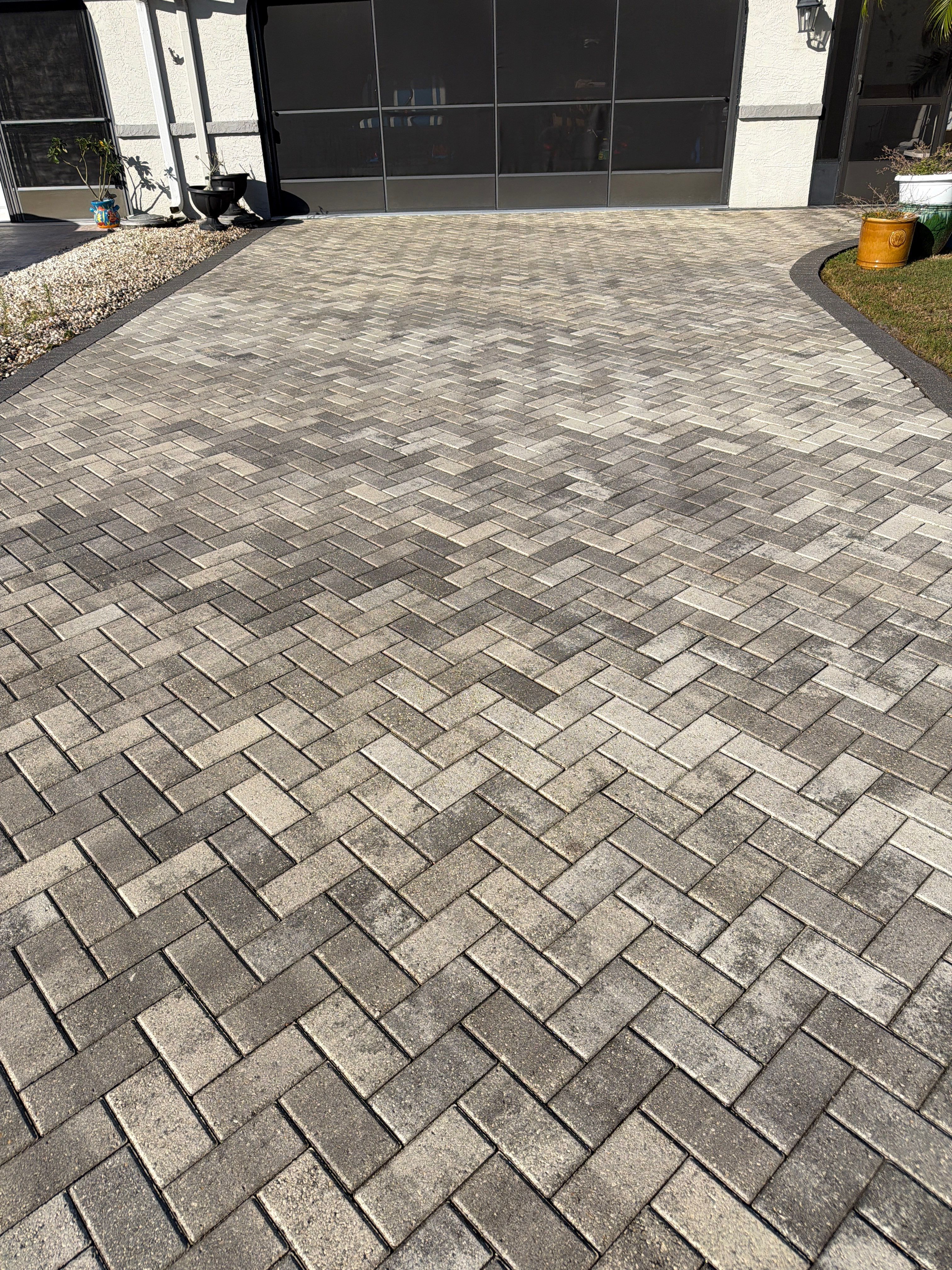 Paver Sealing and Cleaning for Herringbone Driveway in Sun City Center by Supreme Paver Experts