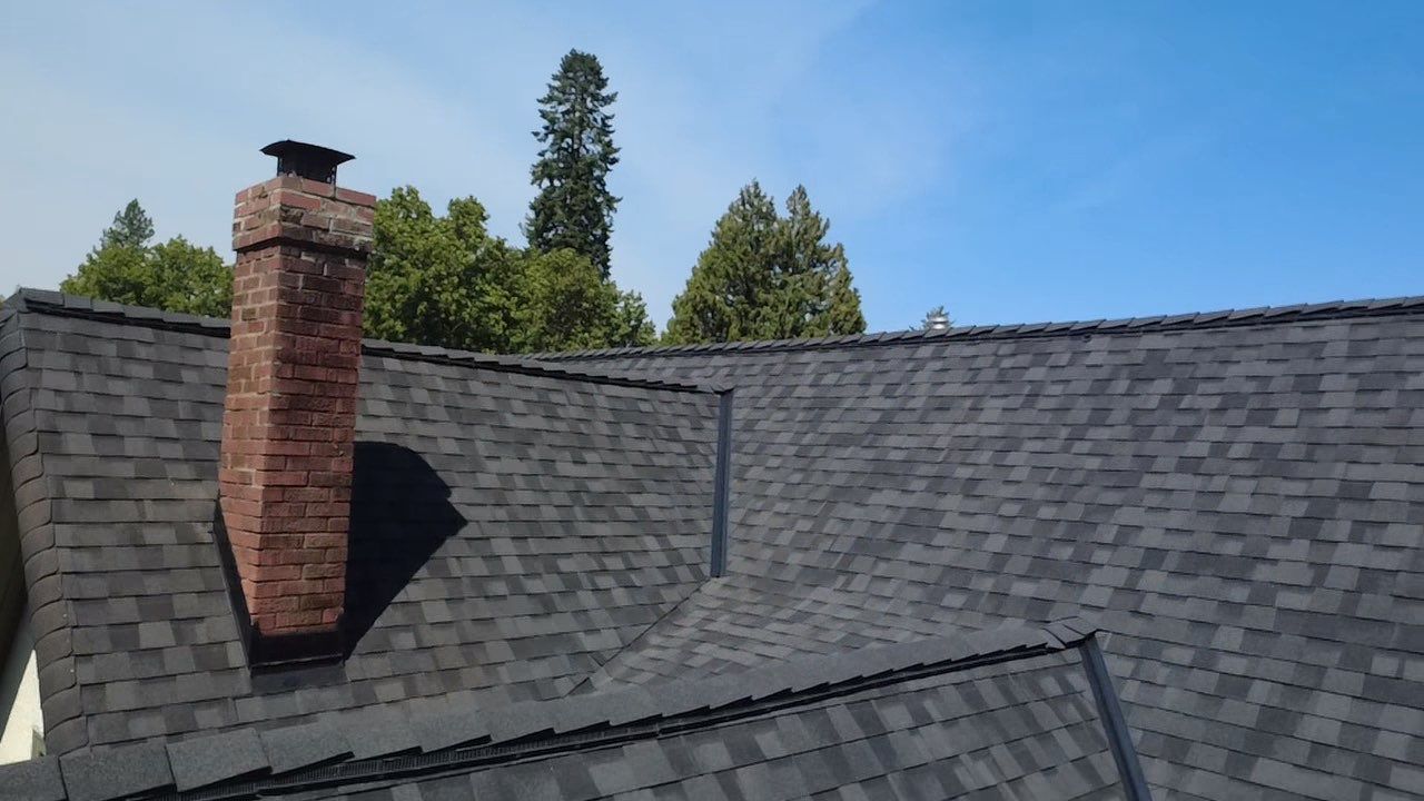 Coeur d'Alene Residential Roof Replacement Using Moiré Black Shingles East Foster Avenue Coeur d'Alene, Idaho 83814 by Alpine Roofing