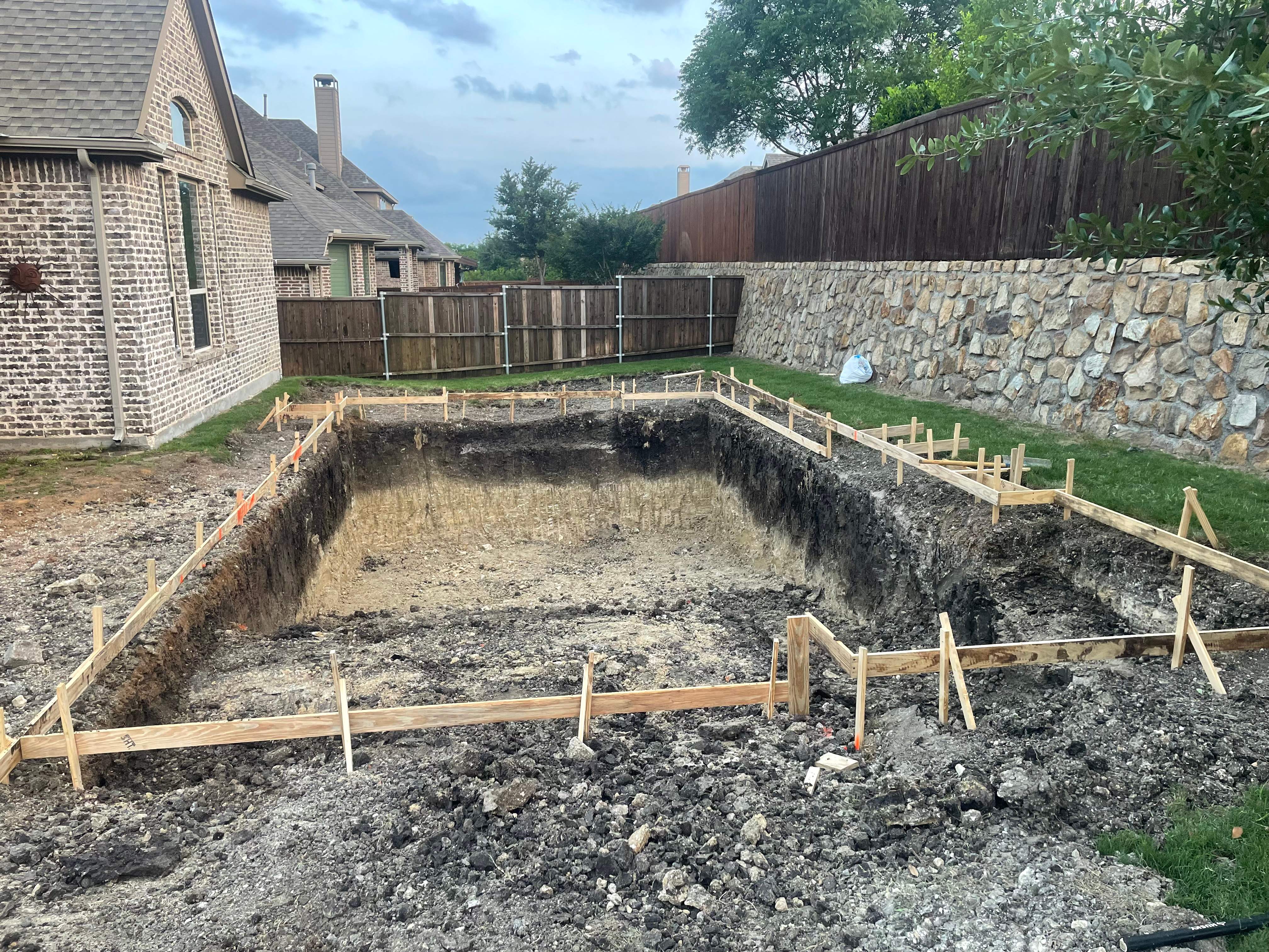 Geometric Pool with Raised Spa and Stone Decking by Pinnacle Pools and Spas - DFW