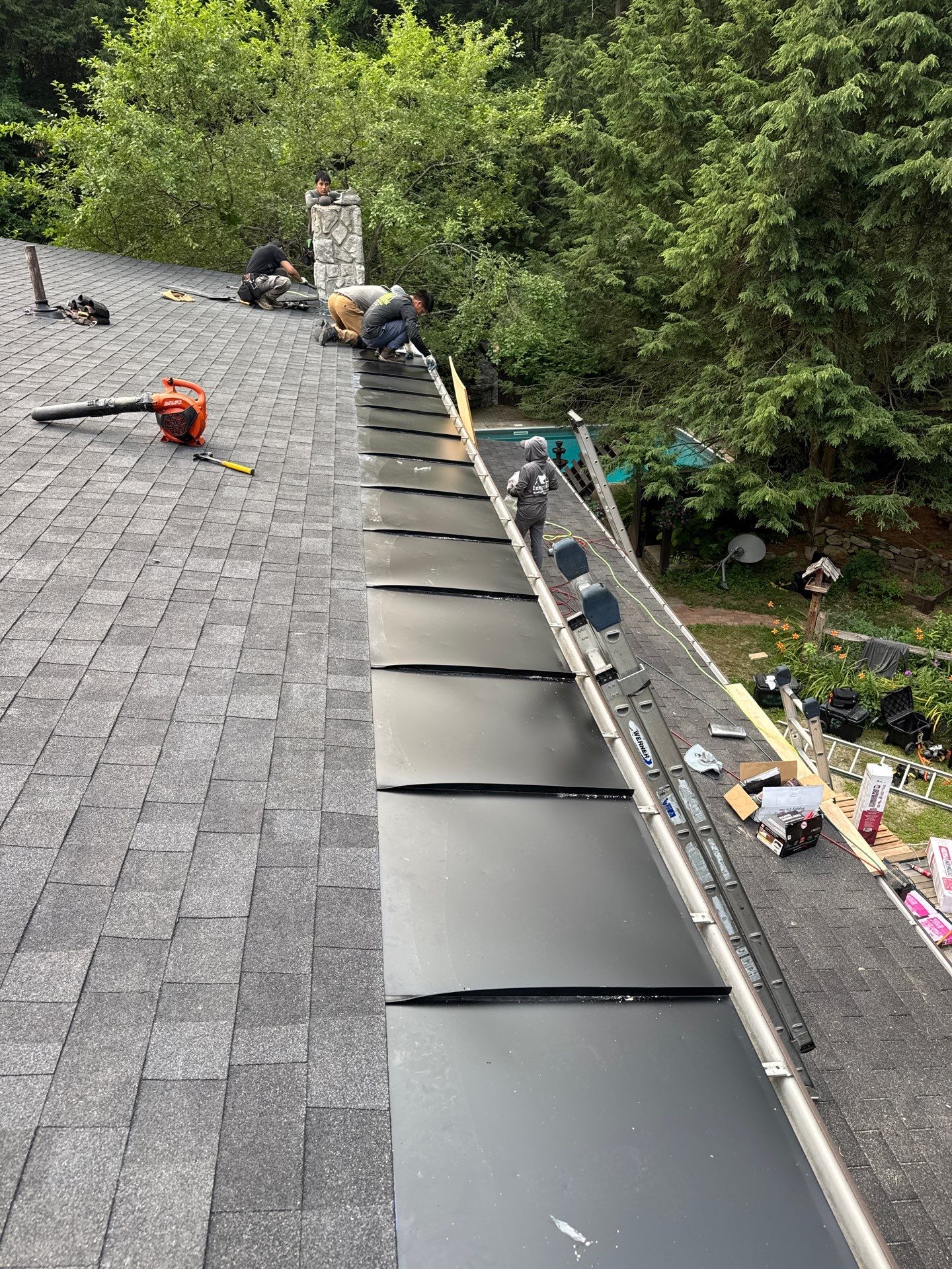 Deerfield, NH Roof Replacement Near Deerfield Fairgrounds with Custom EPDM Rubber Roofing for Stone Turrets by Compass exteriors