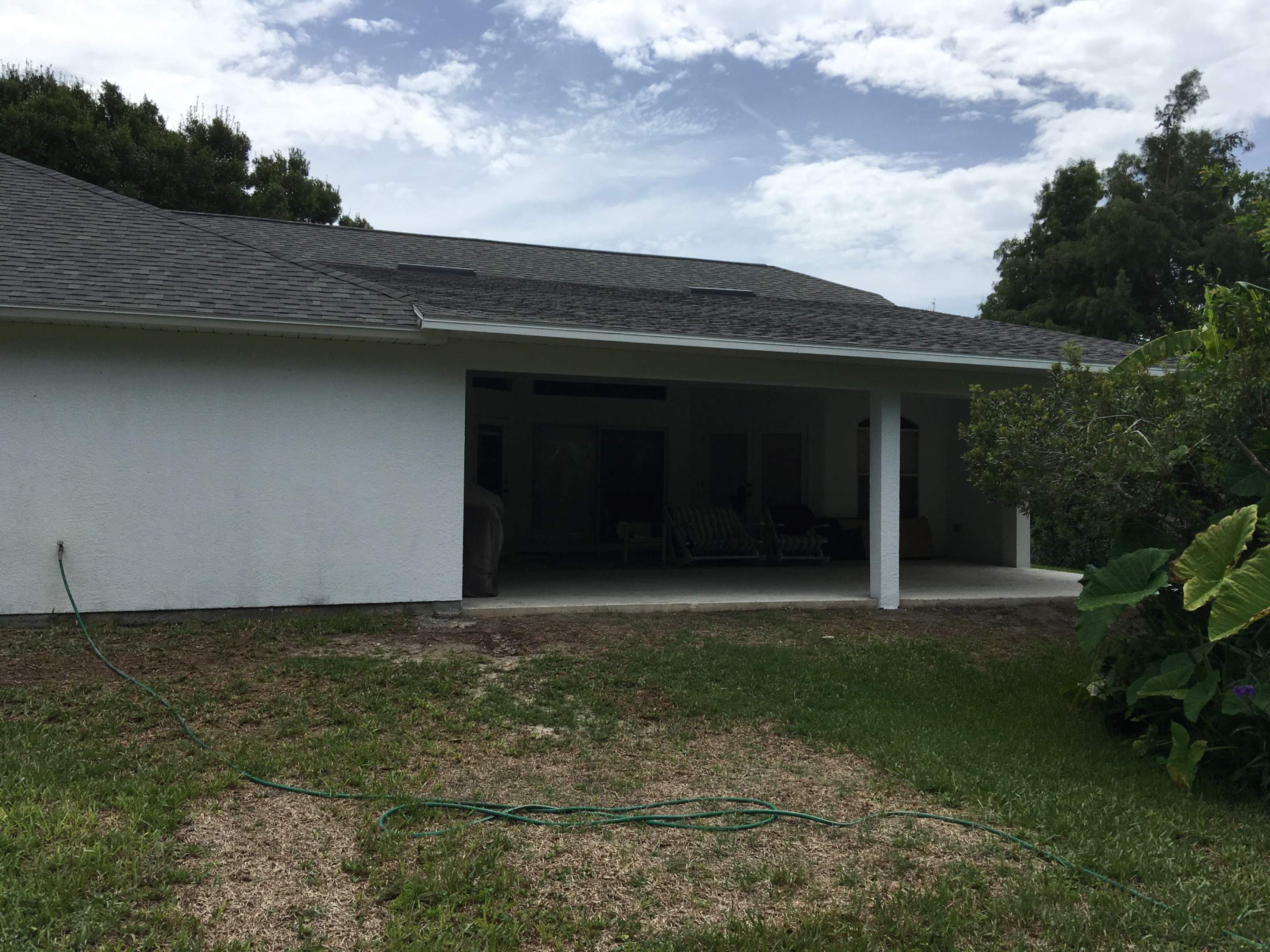 Covered Porch Extension and Structural Patio Addition in Melbourne by Florida Roofing and Renovations Inc.