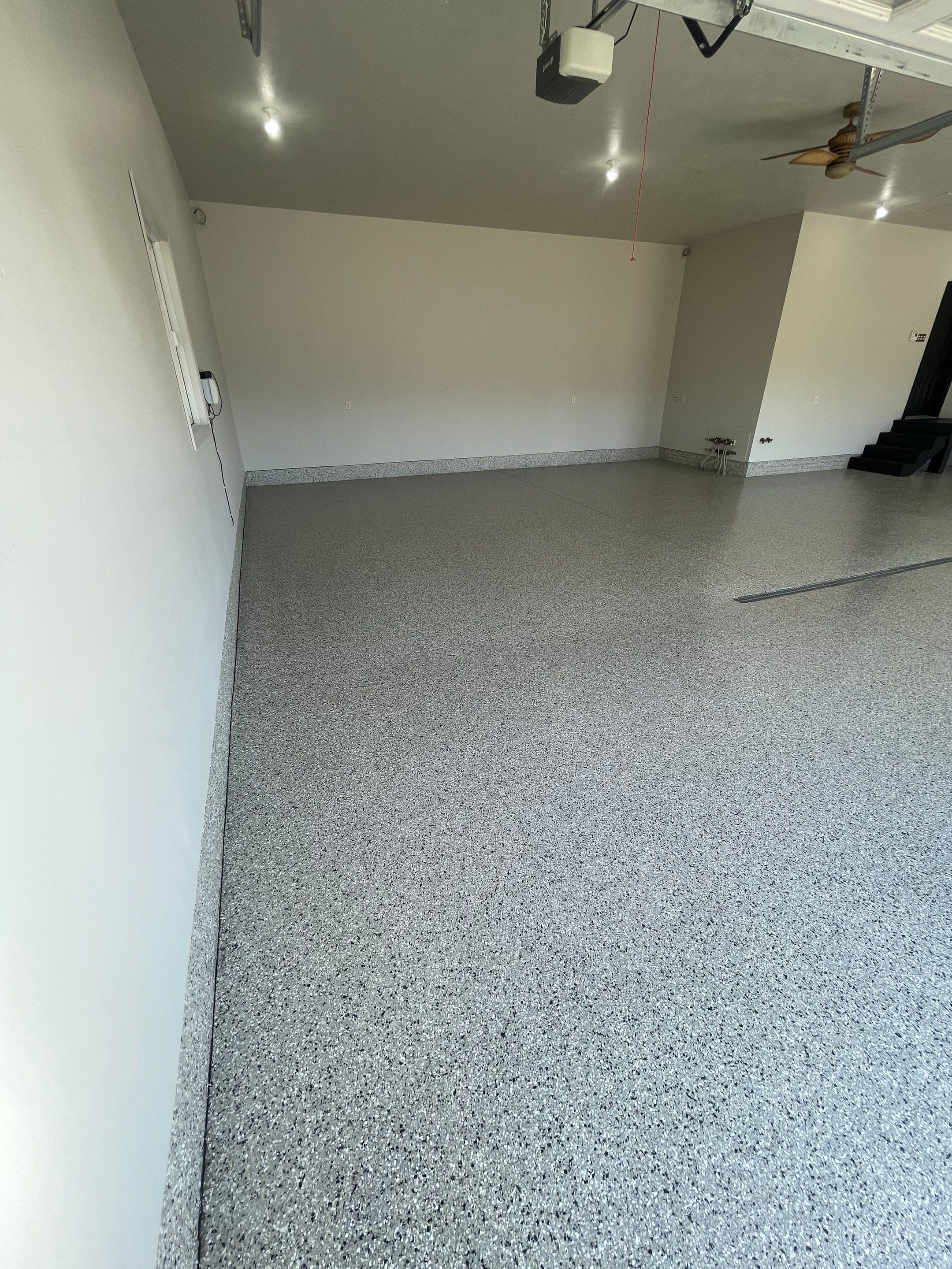 Multi-Car Garage Epoxy Floor Coating in Beresford by Select Painting, Coatings & Garage Cabinets