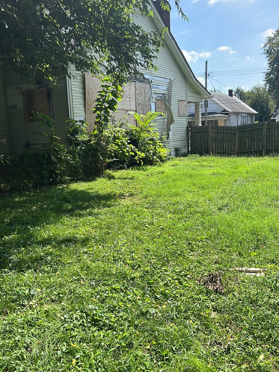 Rental Property Restoration, siding, flooring, gutters, landscaping by Storm Contracting 