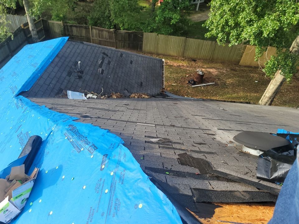 Residential Roofing Installation using Roof Replacement by American Roofing & Construction LLC