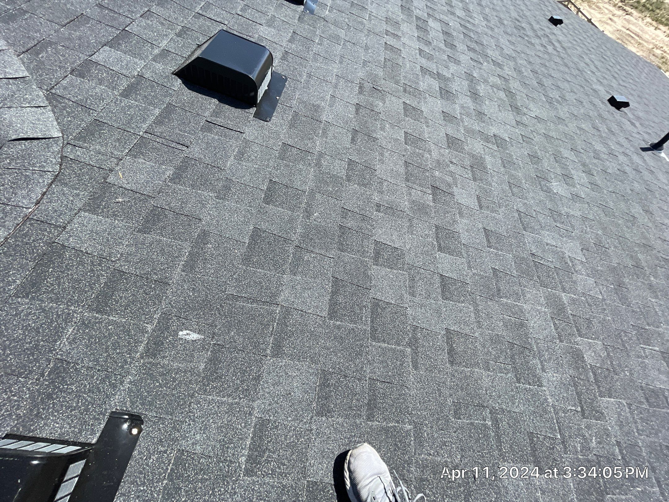 Residential Roofing Installation using Atlas Pinnacle Impact Black Shadow by Blue Peaks Roofing LLC 