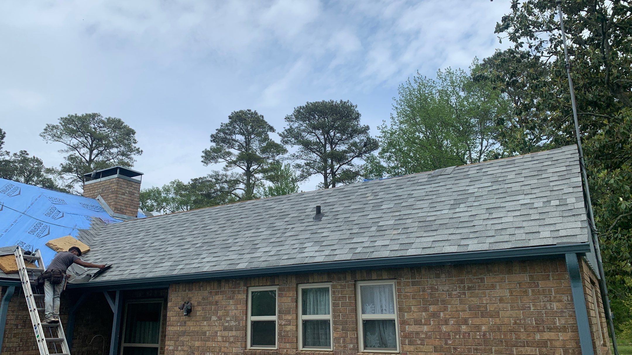 Residential Roofing Installation using 50 mil PVC by Hostetler Roofing
