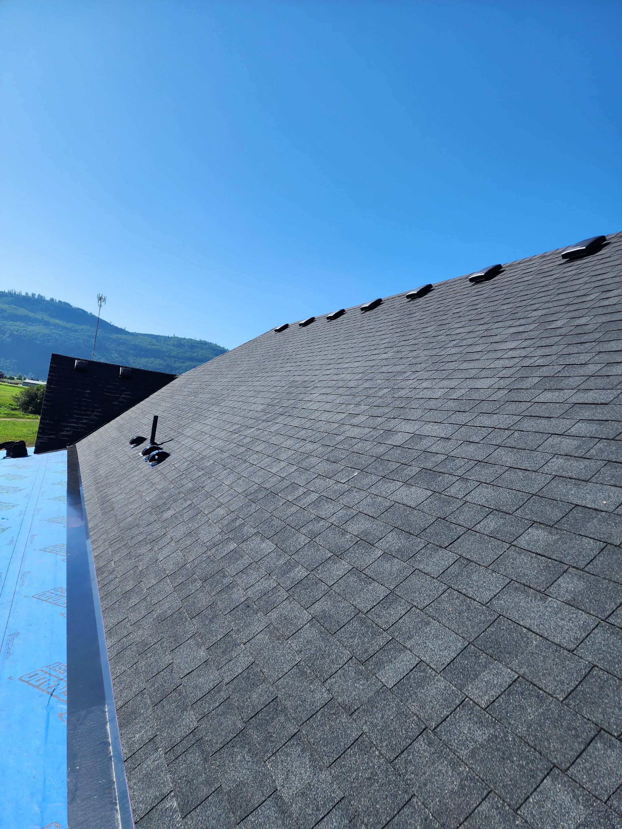 Residential Roofing Installation using OC Oakridge shingles by Top Notch Roofing Inc