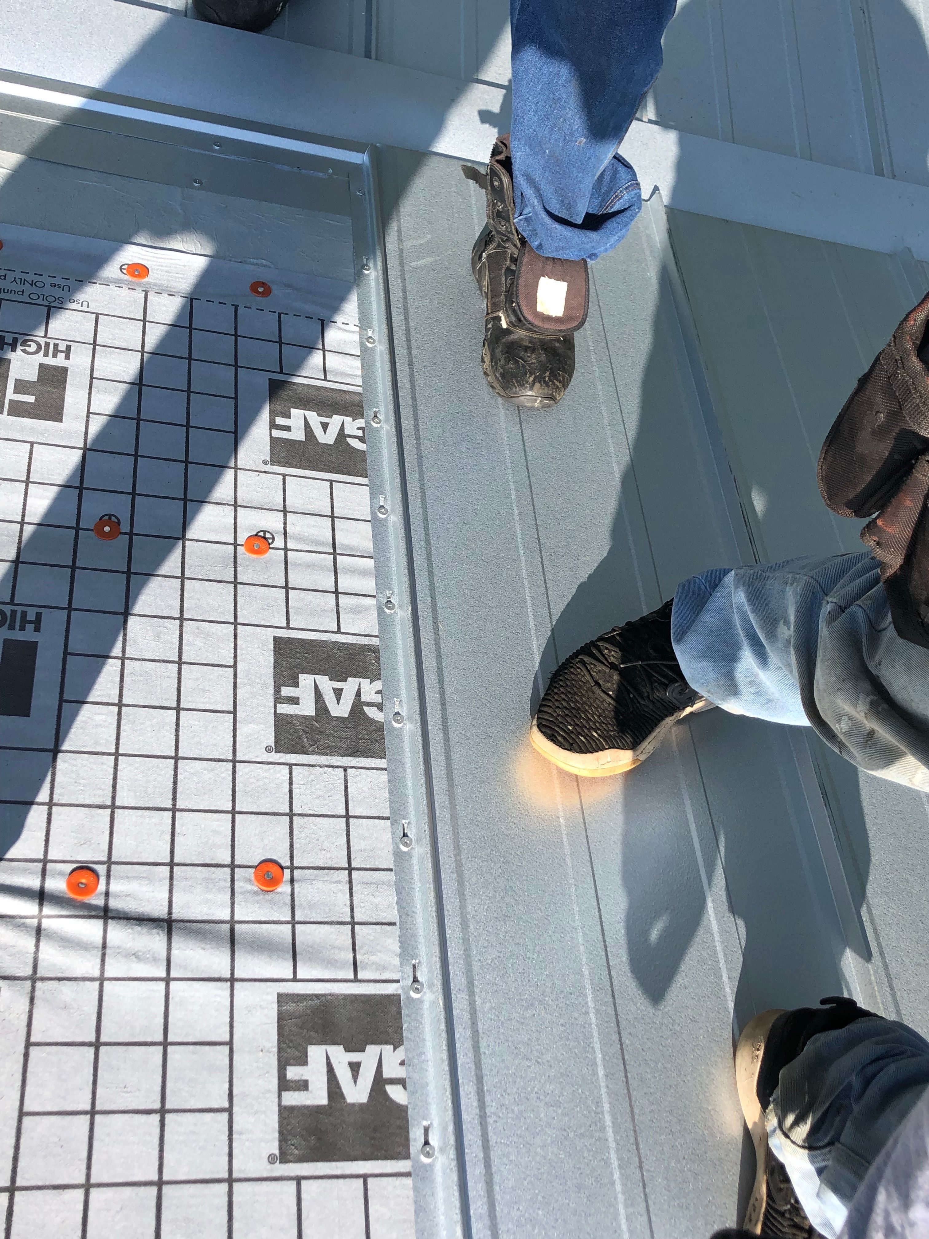 Residential Roofing Installation using Metal roofing by American Roofing & Construction LLC