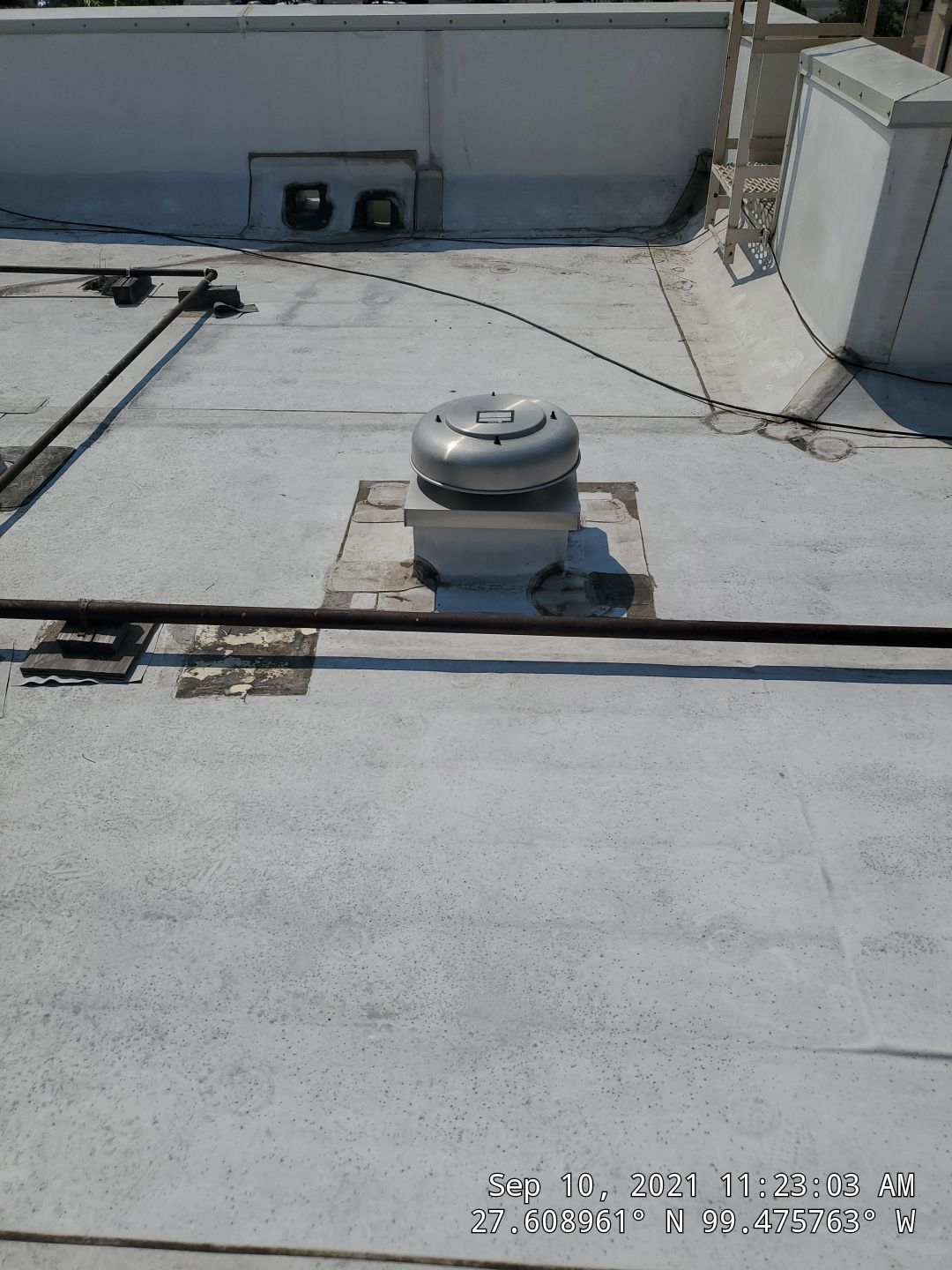 Commercial Roofing Repair using Silicon Roof Coating by JM Flores Roofing & Construction, Inc