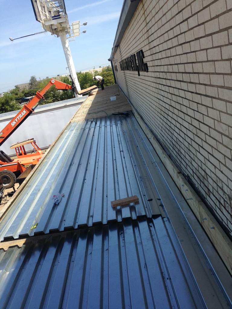 Massive Storm Damage Project - Factory in Arlington by First United Roofing & Construction
