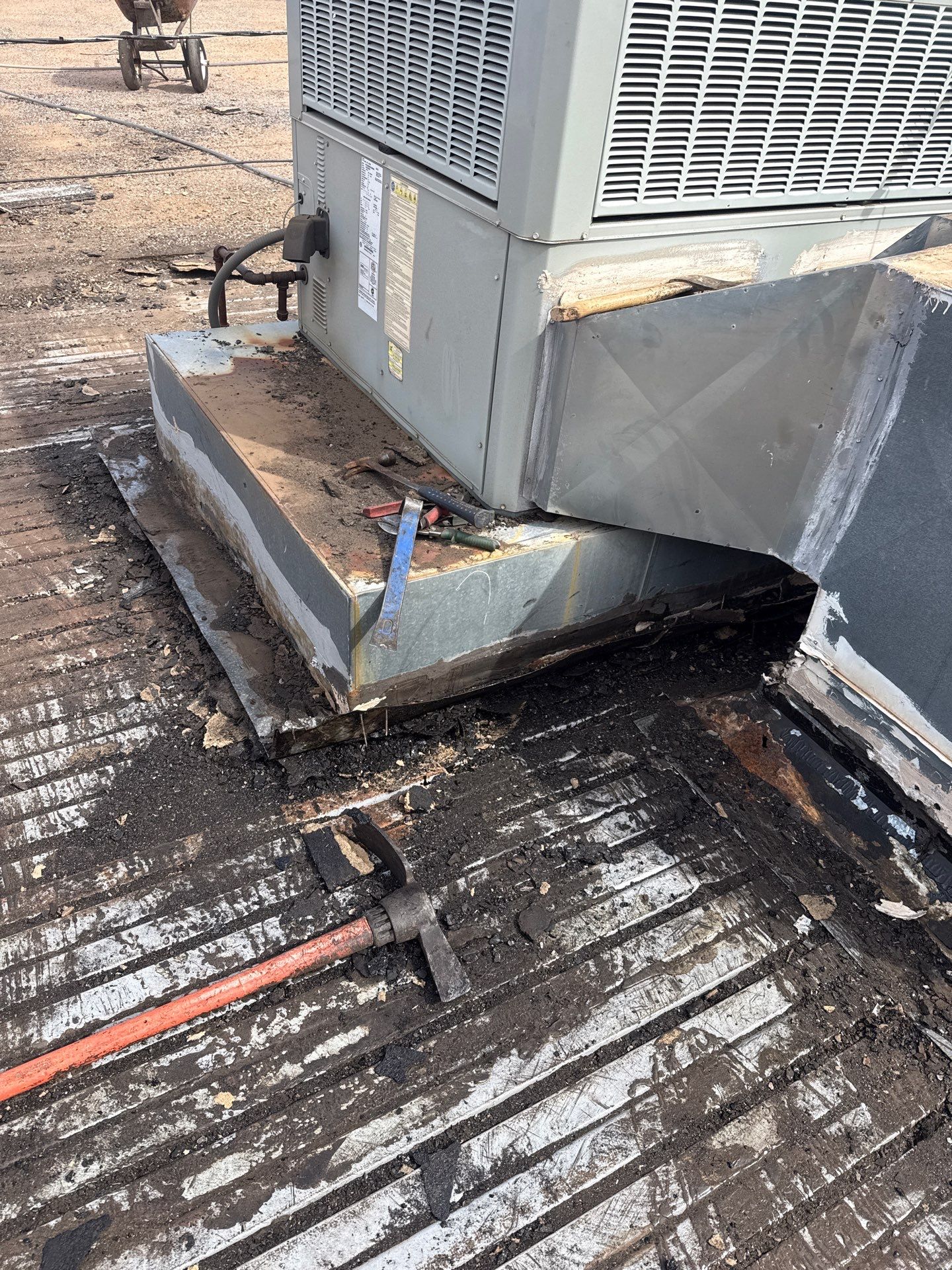 Hollis High School Comprehensive TPO Roof Replacement and Restoration by Secondary Rhodes