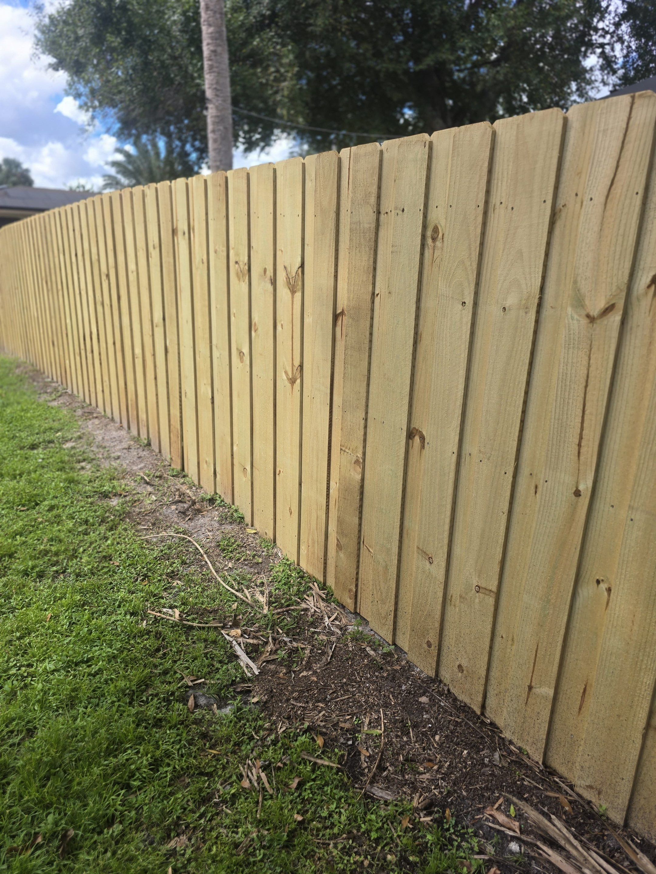Wood Privacy Fence Installation with Double Gate in Port Charlotte by True Fence LLC