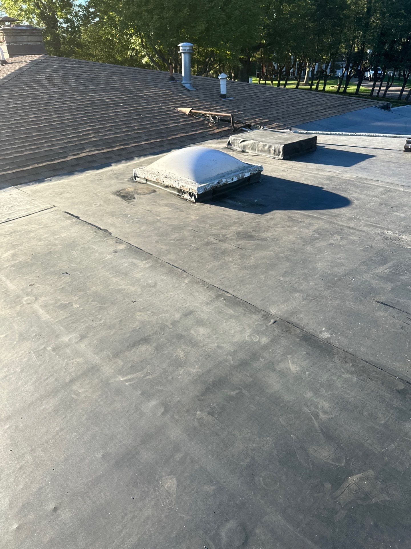 Residential Roofing Installation using EPDM  by Rainstoppers Roofing