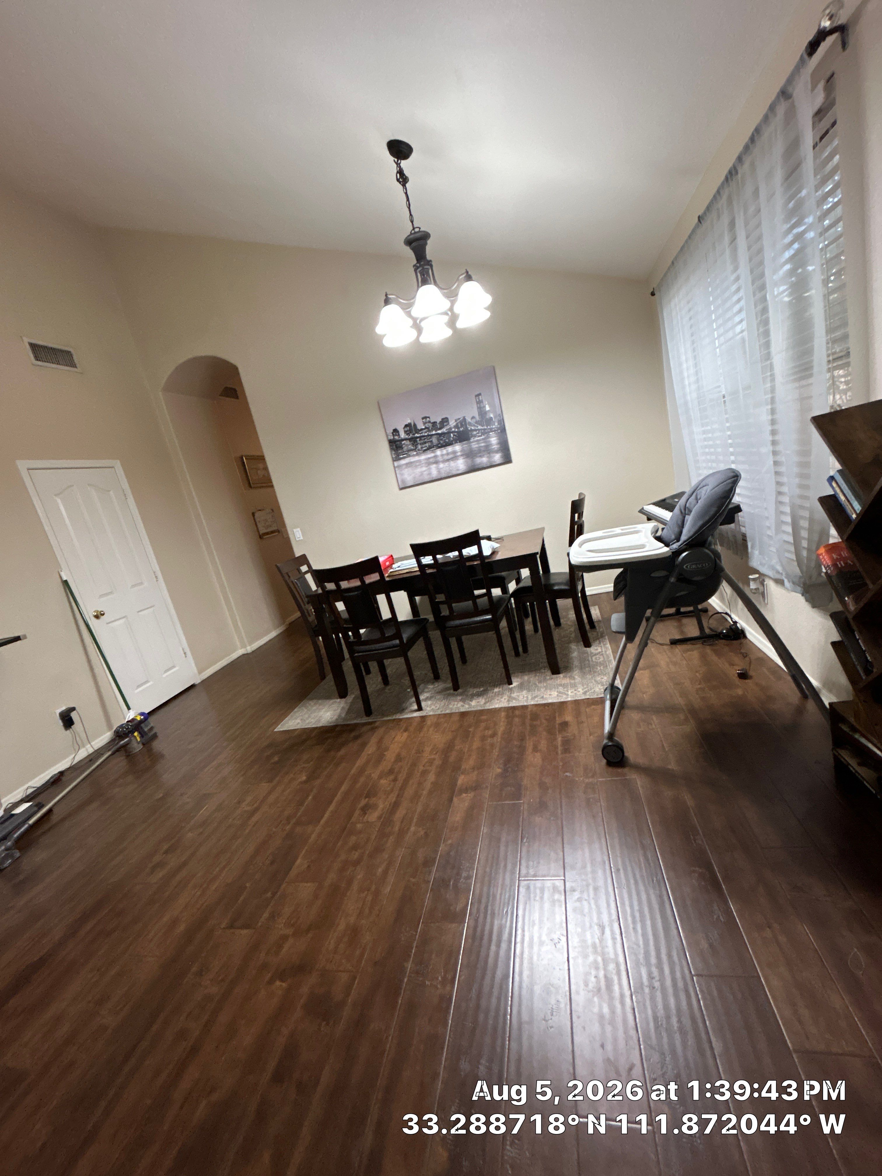 Chandler Dining Room Update with Dark Wood Laminate Flooring by CompanyCam Sales Demo
