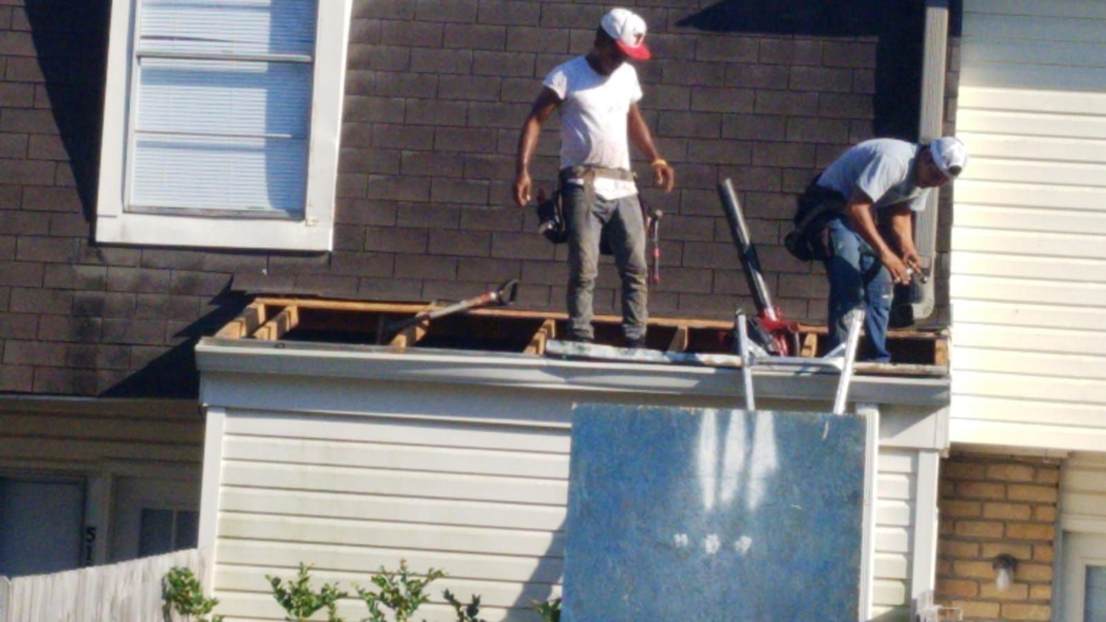 Residential Roofing Installation using Roof Replacement by American Roofing & Construction LLC