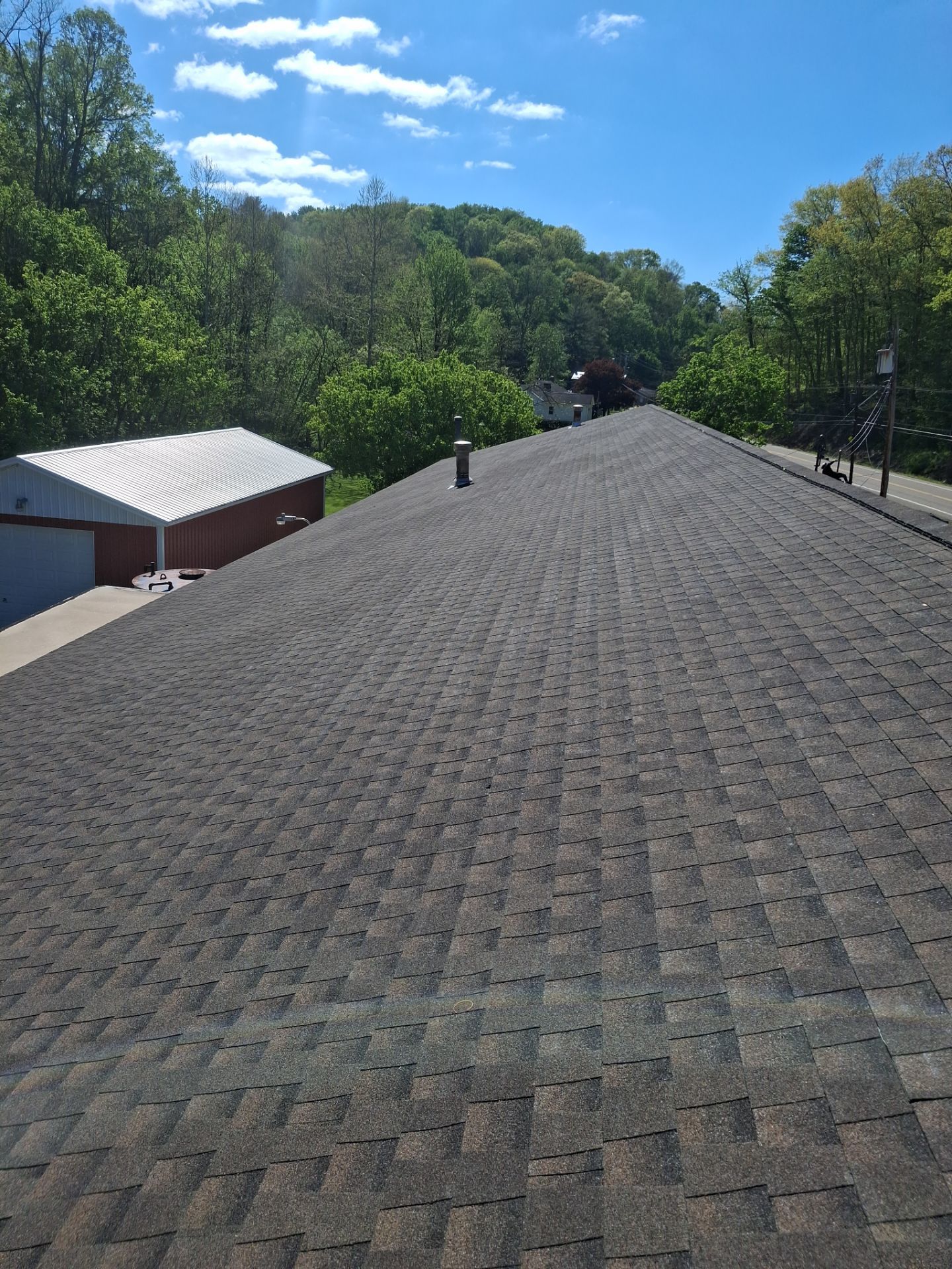 Commercial Roofing Installation using GAF Timberline HDZ Barkwood by Rainstoppers Roofing