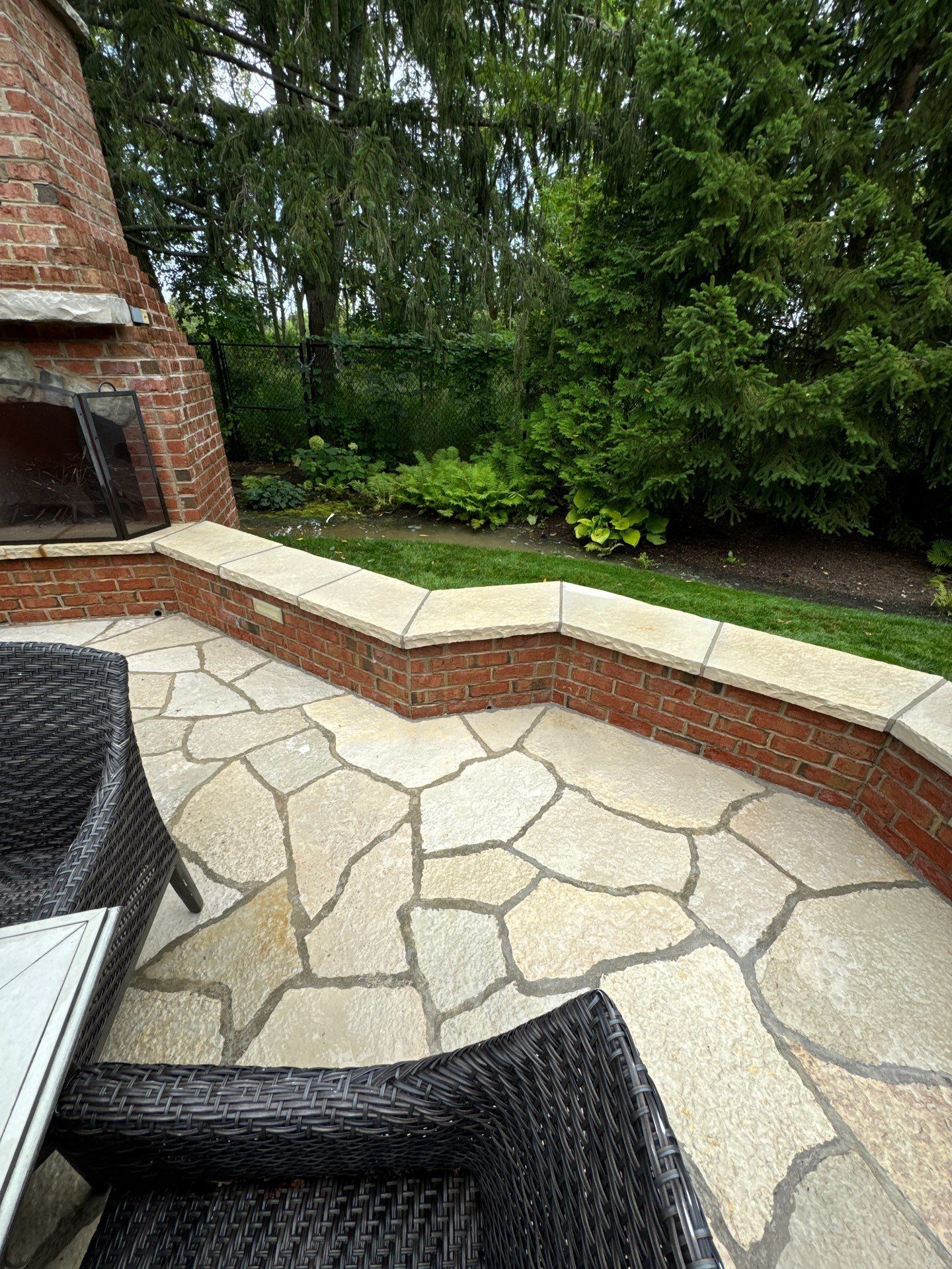 natural stone using Algaecide, soft wash soap by Northern Power Washing LLC.