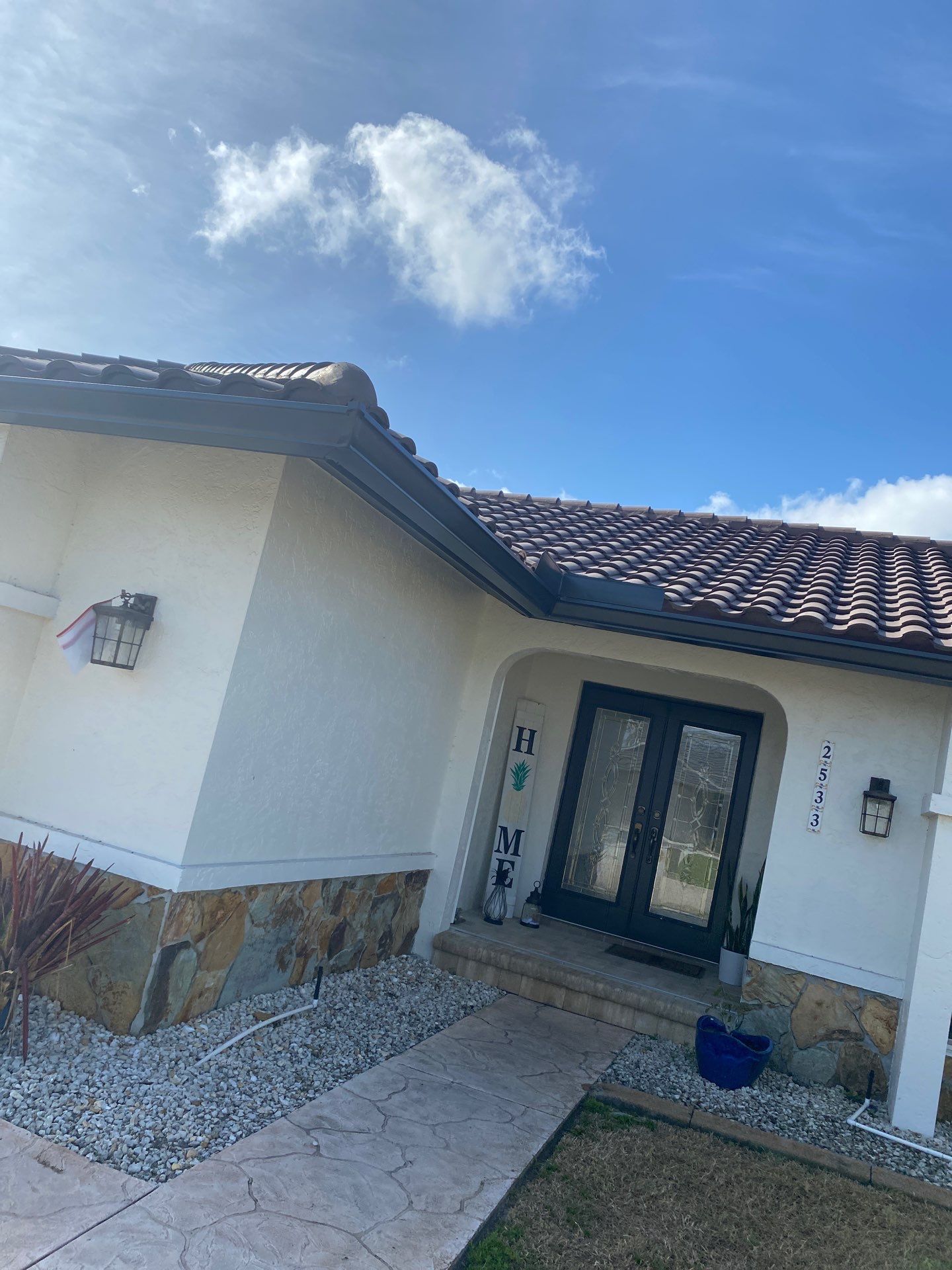 Black Seamless Gutters for Modern Homes in Punta Gorda by Gutter Professors