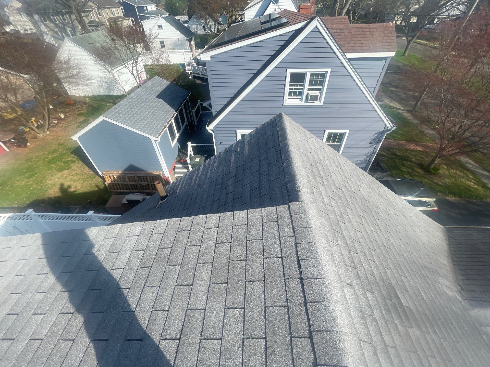 Residential Roofing Replacement Featuring Owens Corning Estate Gray Shingles in Milford by A Plus Exterior