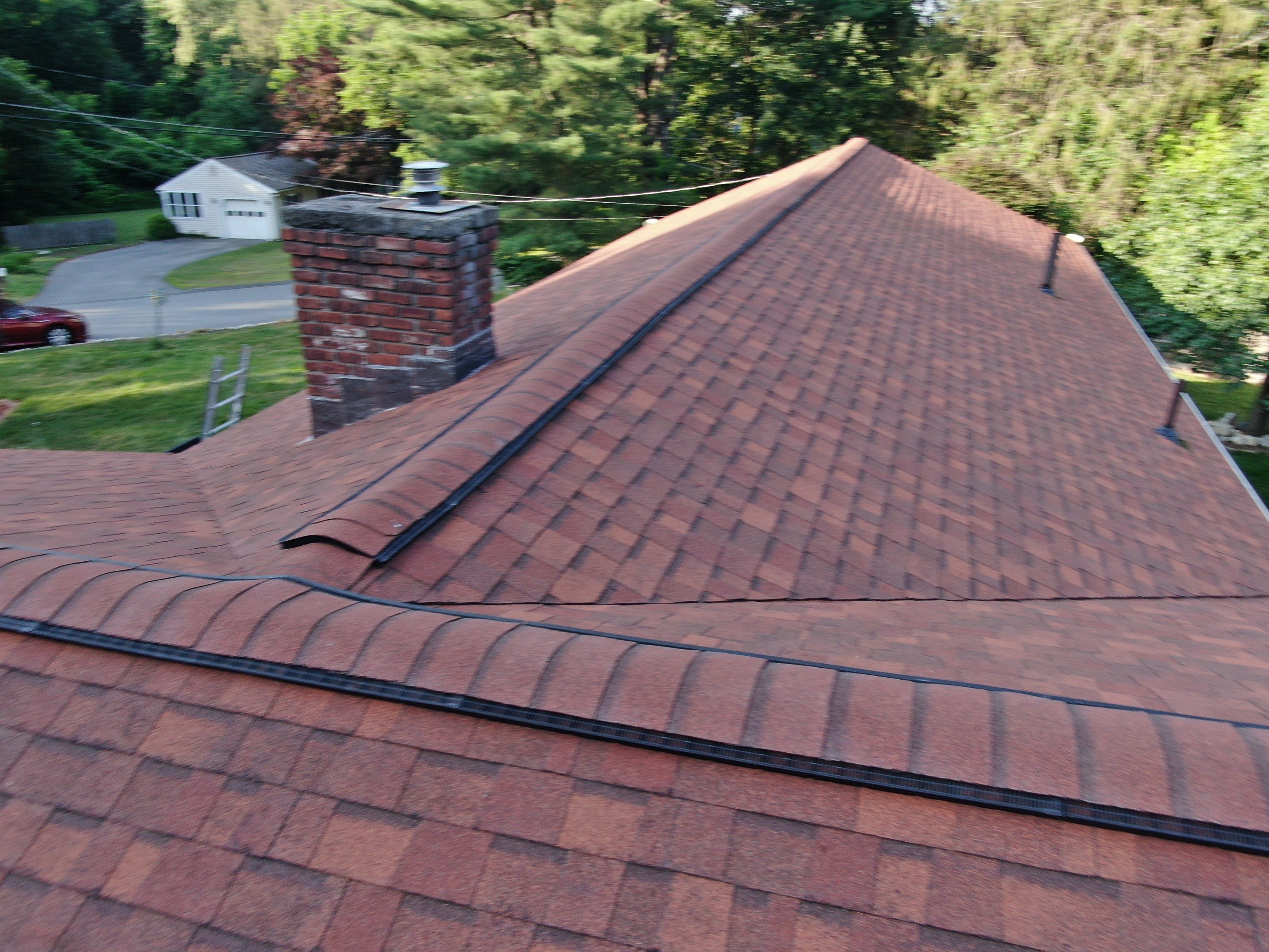 Roof Replacement with Gutter Guards – Westford, MA by Mighty Dog Roofing of Greater Middlesex County