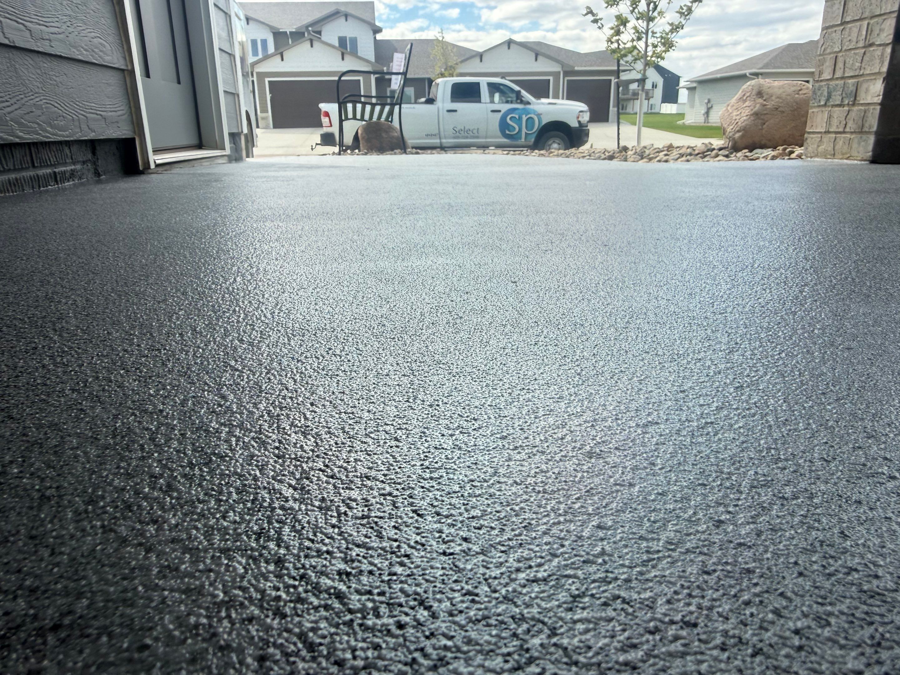Decorative Flake Concrete Coating for Sioux Falls Porch and Patio by Select Painting, Coatings & Garage Cabinets