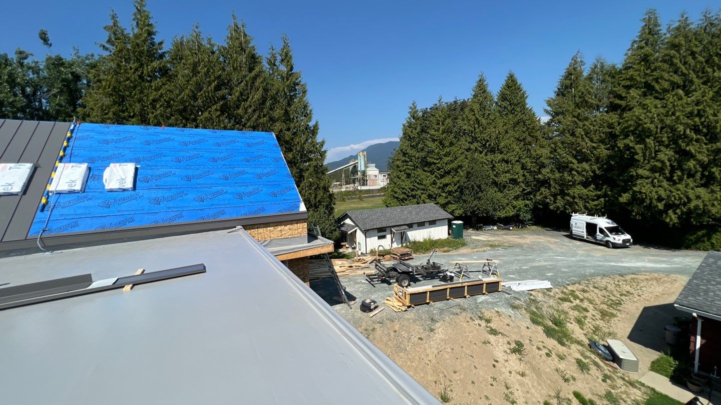 Residential Roofing Installation using multiple products by Top Notch Roofing Inc