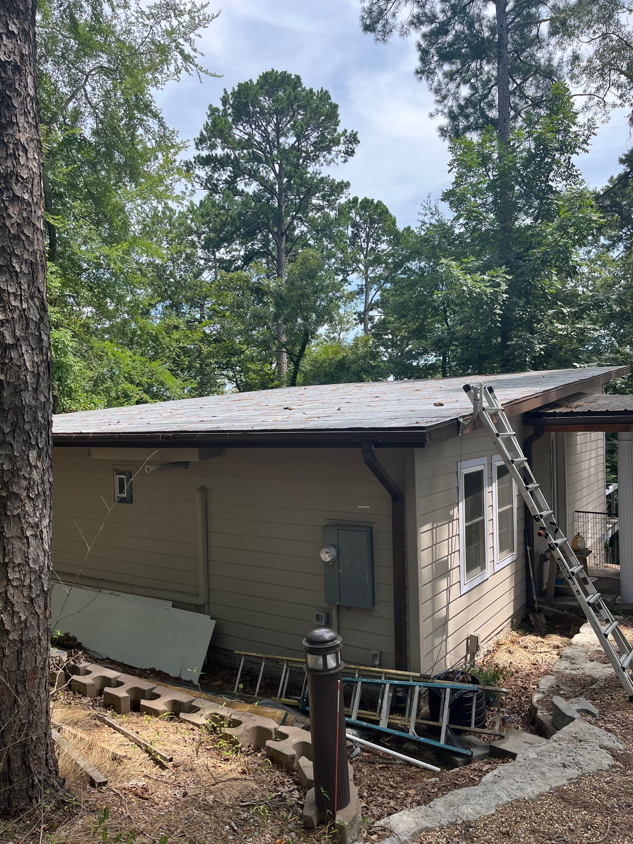 Standing Seam Metal Roof and Gutter Installation in Hot Springs by Temple Roofing and Exteriors