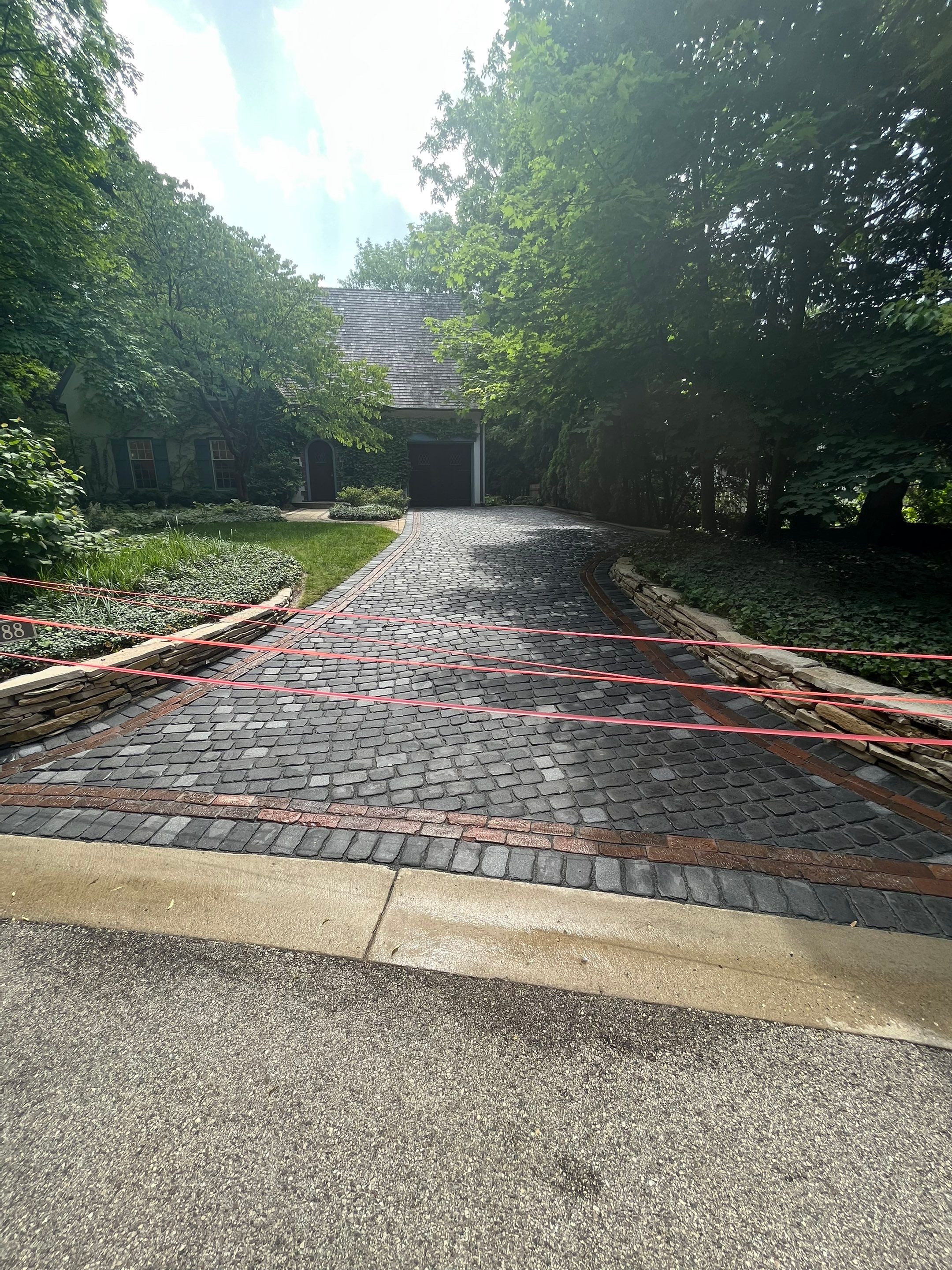 Glencoe, IL brick paver clean sand seal, repair, and reseal by Northern Power Washing LLC.