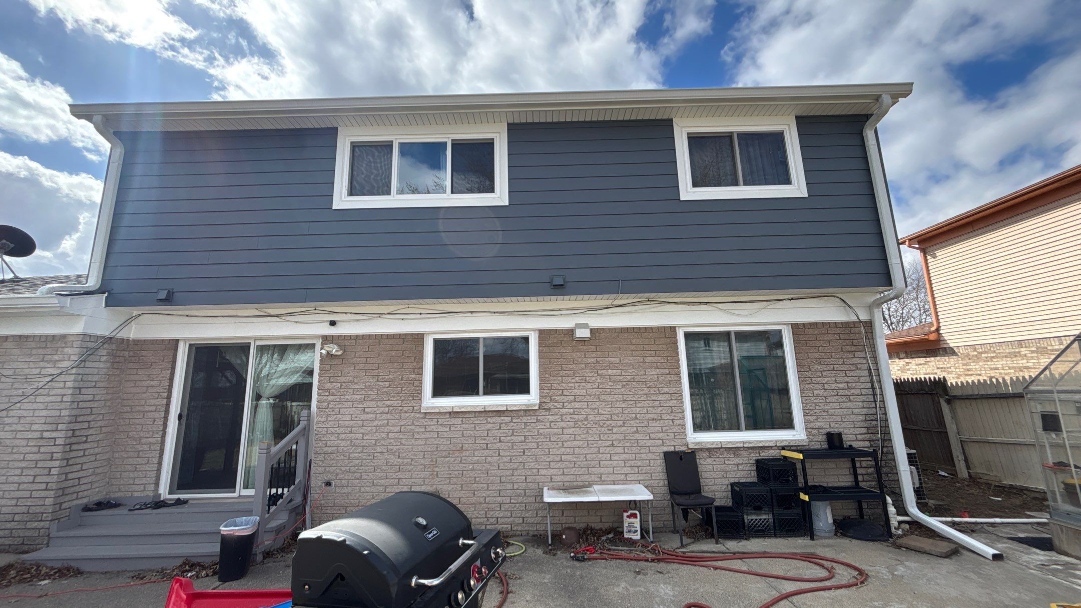 Siding Replacement using Alside Midnight Blue by 180 Contractors
