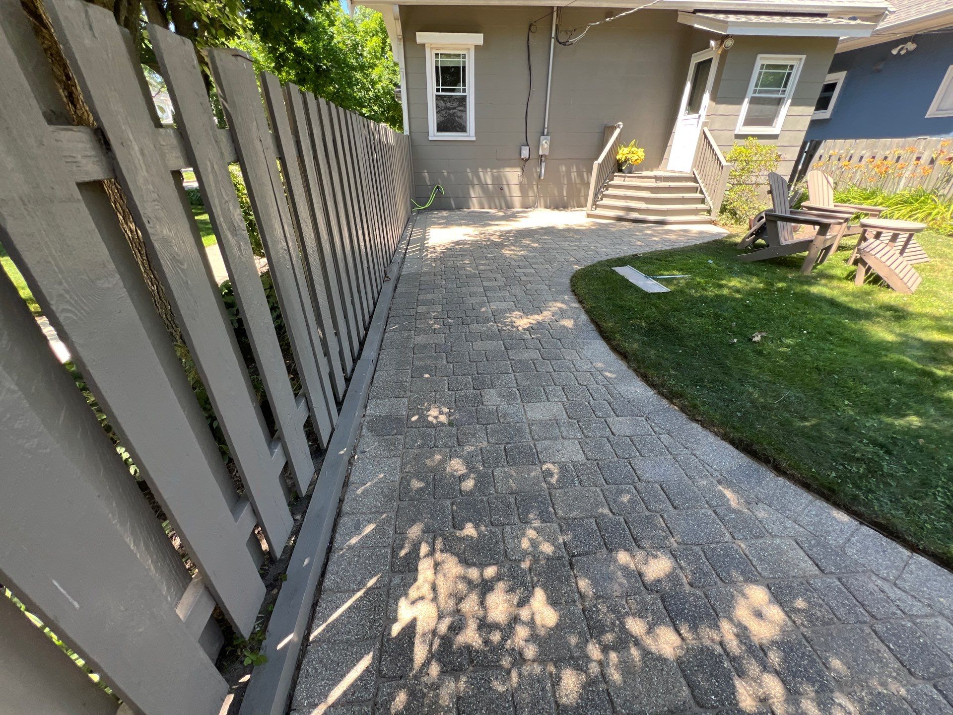 Brick paver cleaning and sealing by Northern Power Washing LLC.