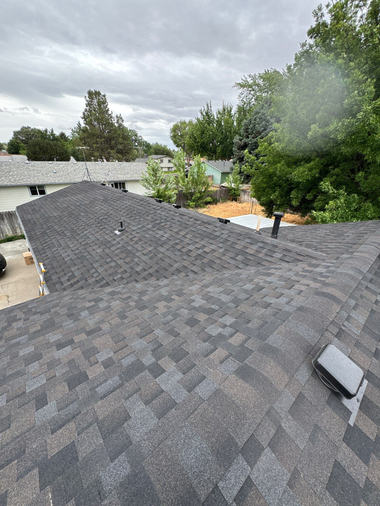Residential Roof Replacement With Dark Gray Architectural Shingles in Mountain Home by Olive Roofing