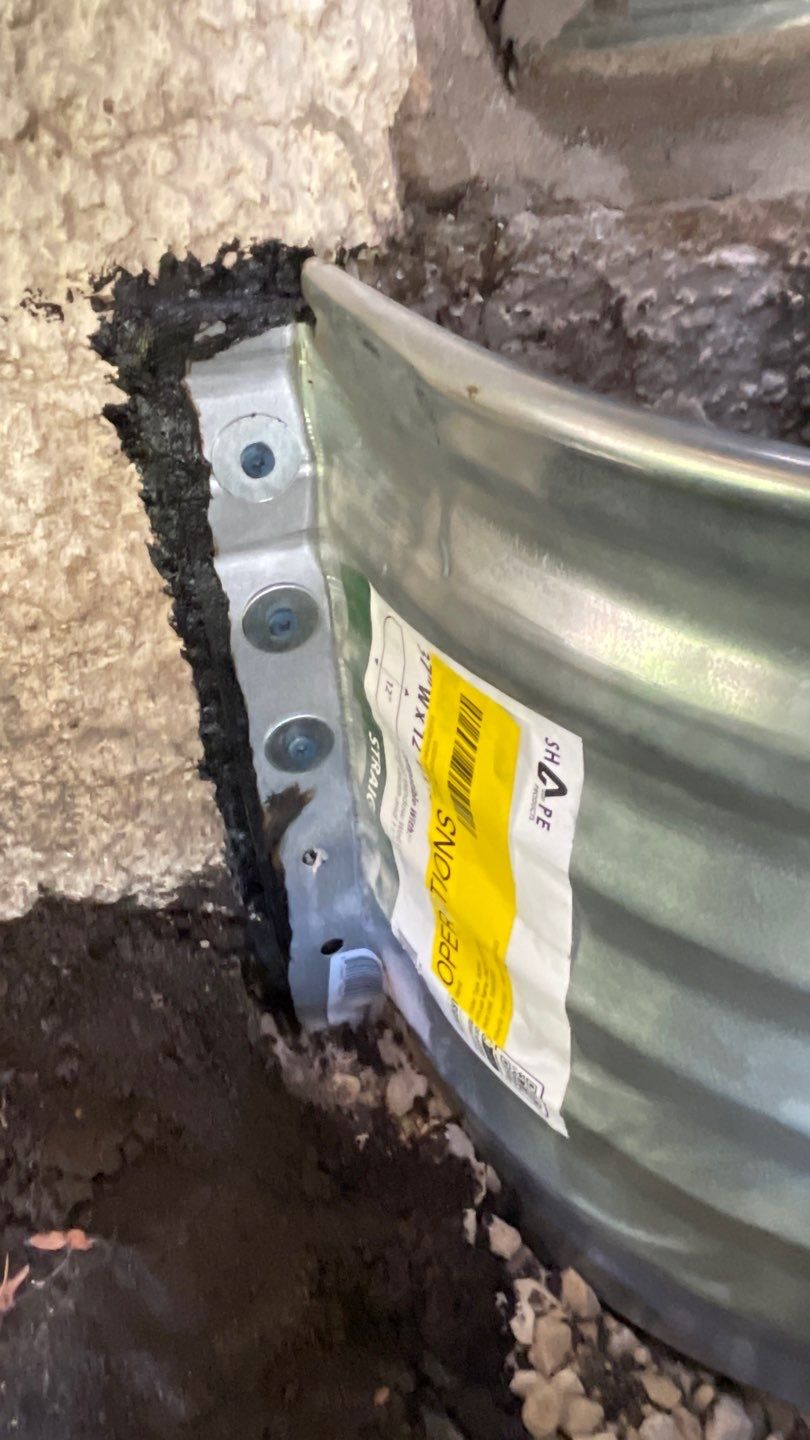 Window Wells & Foundation Grading in South Minneapolis by Waterproofing Northeast