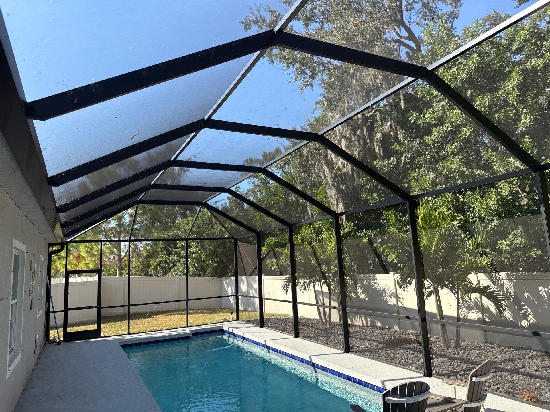 Painted Pool Deck & Screen Enclosure Cleaning | Heron Creek, Palmetto FL by Sunshine AquaWash