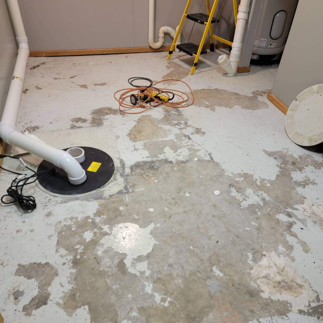 Full Garage and Basement Epoxy Floor Coating in Winner by Select Painting, Coatings & Garage Cabinets